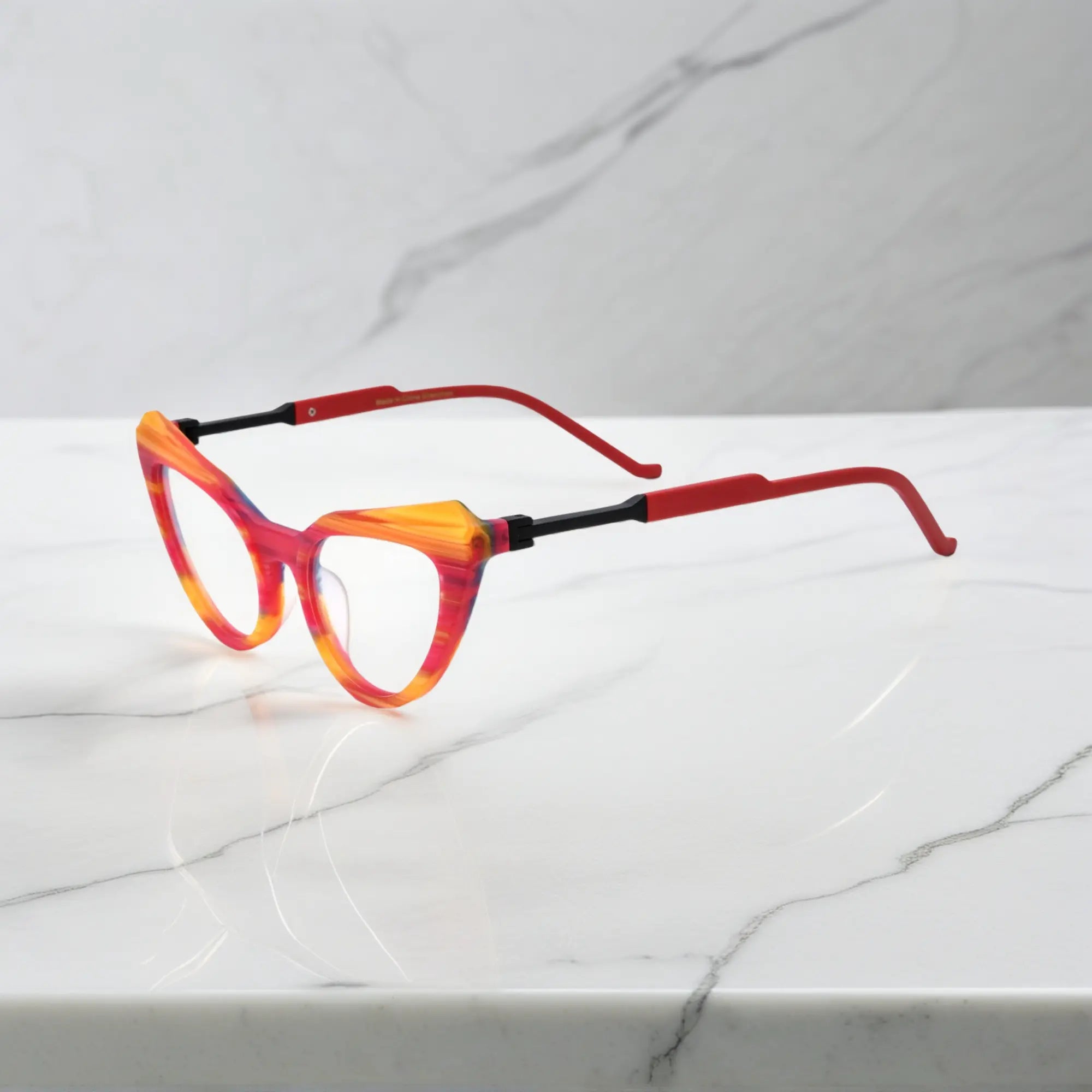 Side view of Rainbow Stripe butterfly eyeglasses, featuring colorful gradient arms and bold acetate edges.