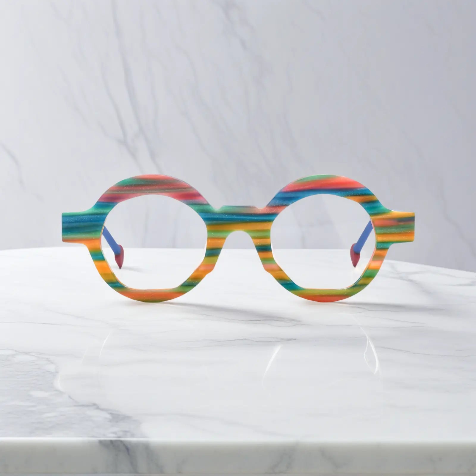 Front-facing view of VoyueLens™ VL19355 Rainbow Stripe polygon eyeglasses featuring colorful matte acetate frame and bold design, perfect for prescription lenses