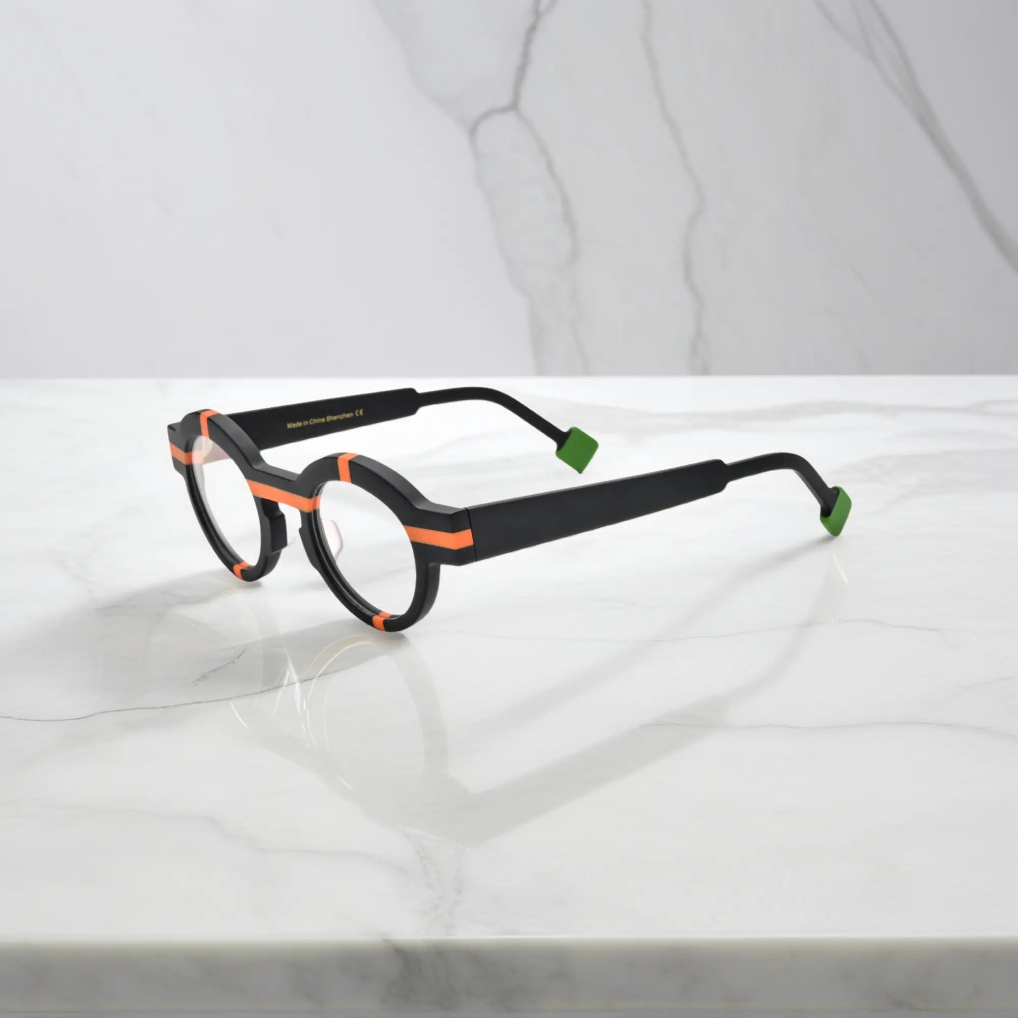 Side view of VoyueLens™ Retro Geometric Round Glasses in charcoal black with matte-finished flexible temples.