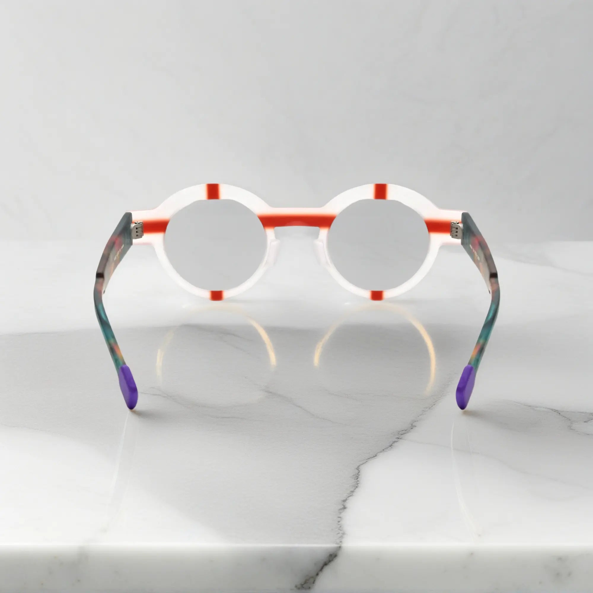 Subtle, modern angle showcasing the matte translucent round shape in crystal clear.