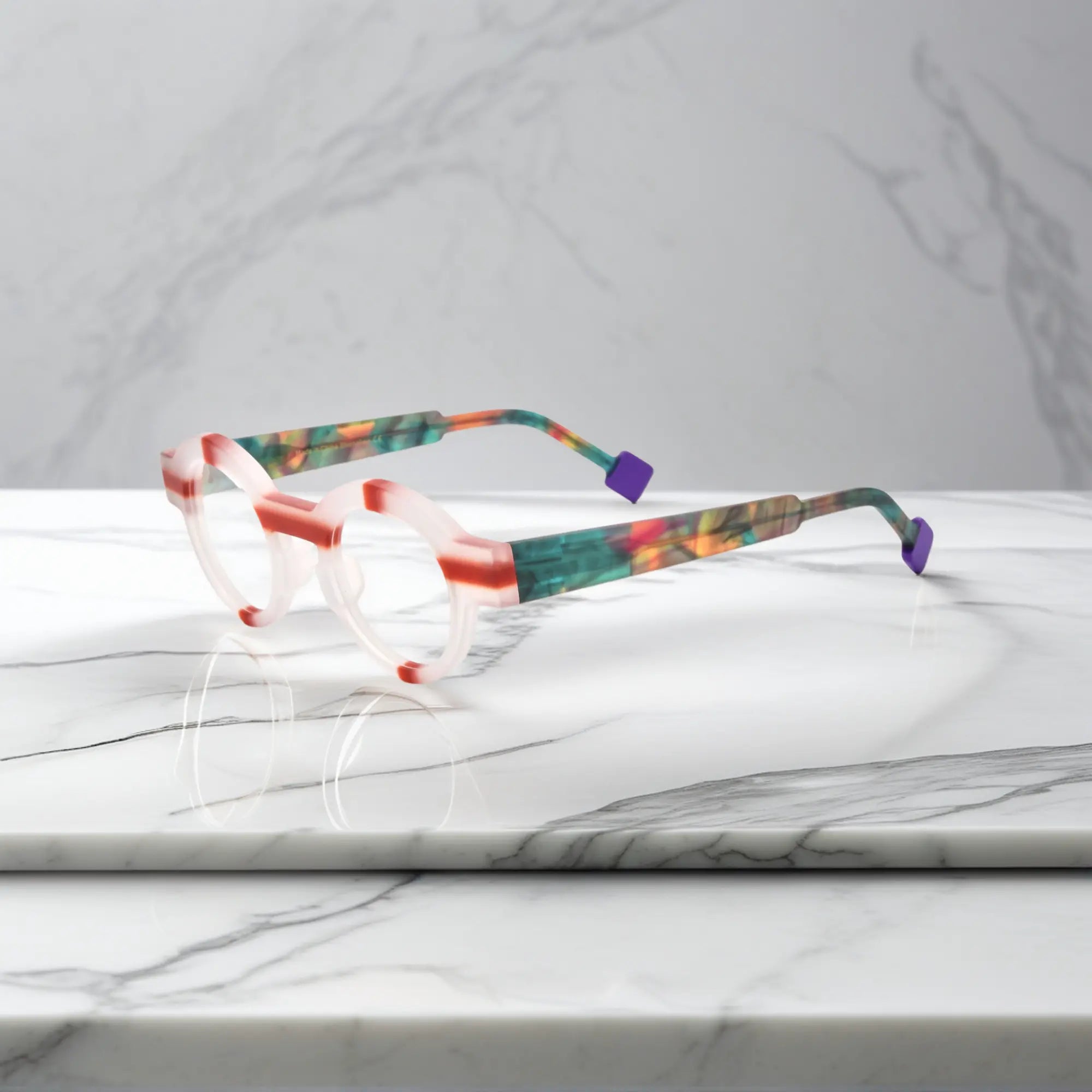 Sleek side view of VoyueLens™ glasses in crystal clear matte acetate.