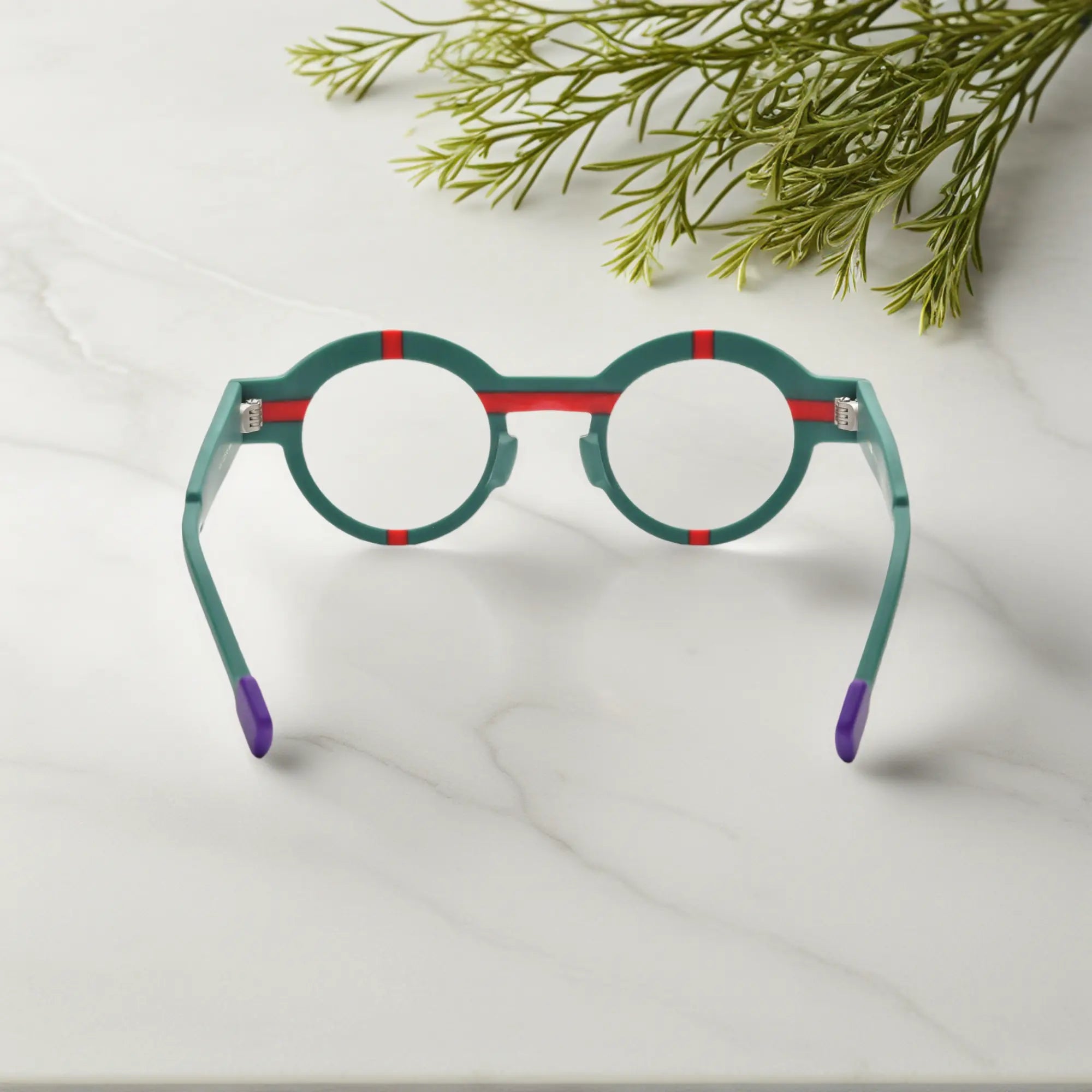 Angled view of VoyueLens™ Retro Geometric Round Glasses in forest green, showing off the geometric round frame with matte detailing.