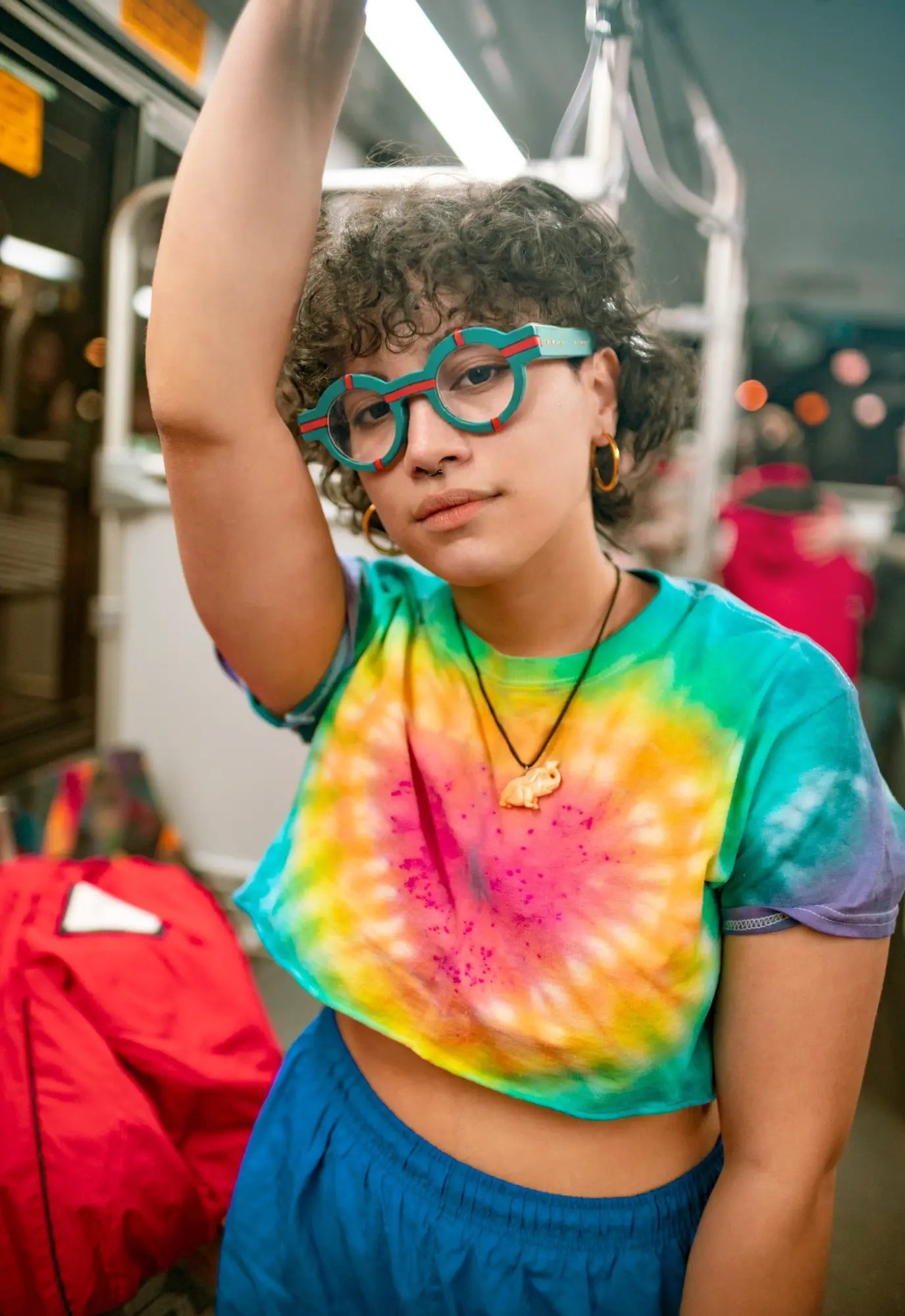 Model wearing VoyueLens™ Retro Geometric Round Glasses in forest green, styled with a modern matte finish.