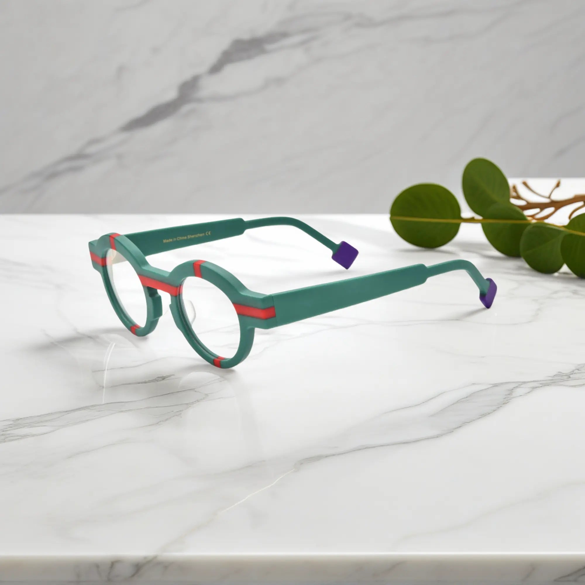 Side view of VoyueLens™ Retro Geometric Round Glasses in forest green, highlighting the acetate temple and matte surface.