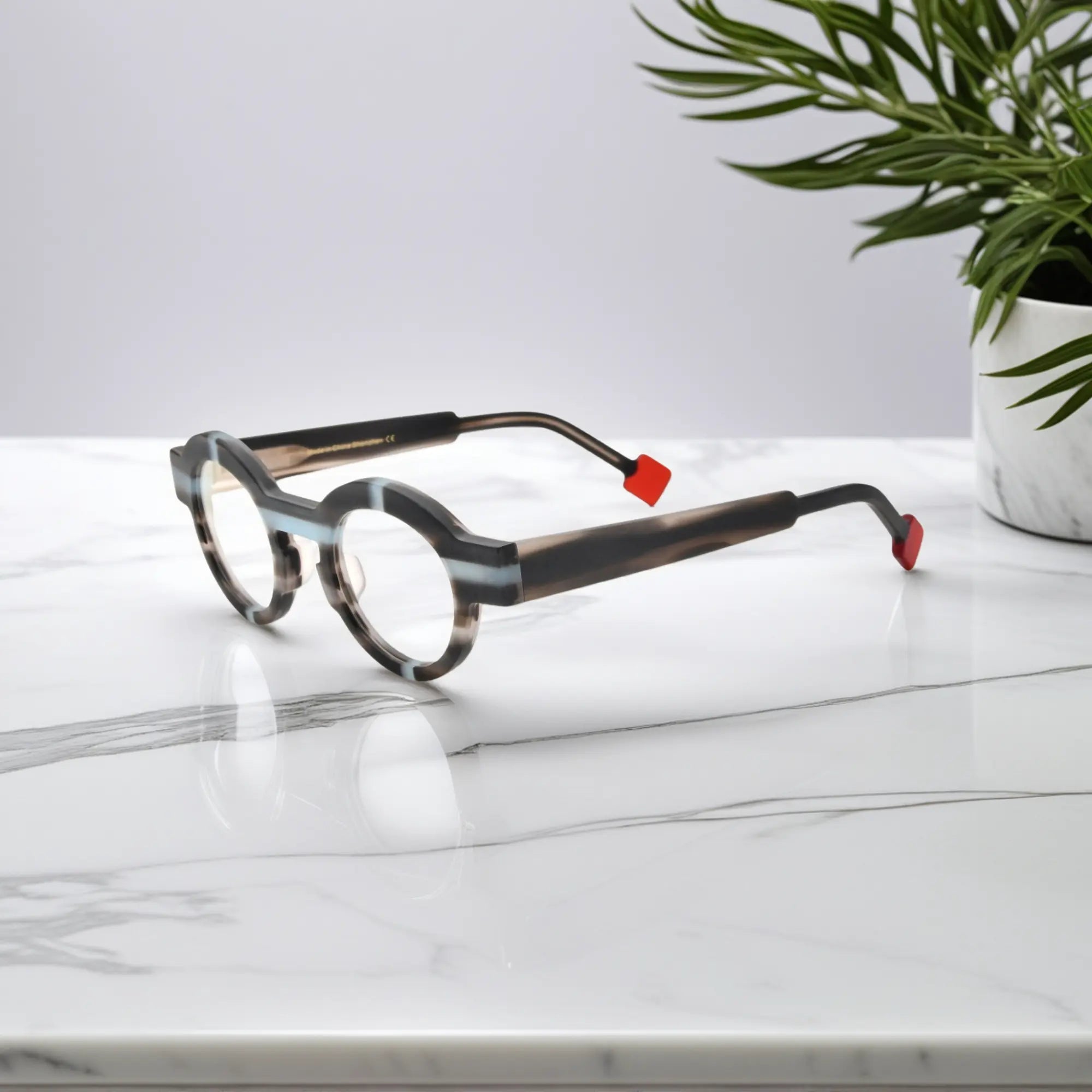 Side profile of VoyueLens™ glasses in slate gray with contemporary matte finish.