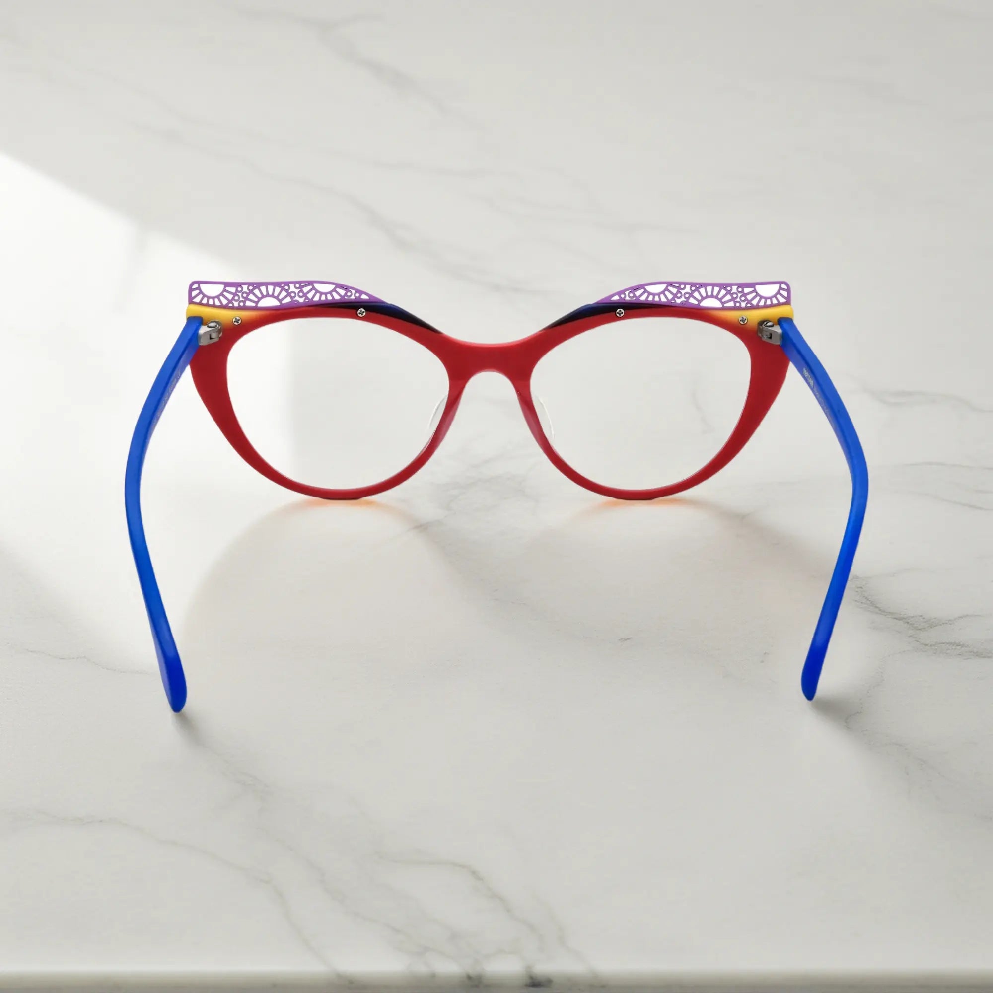 Back View of VoyueLens™ Scarlet Horizon cat-eye eyeglasses with red-to-orange gradient and signature lace-pattern design.