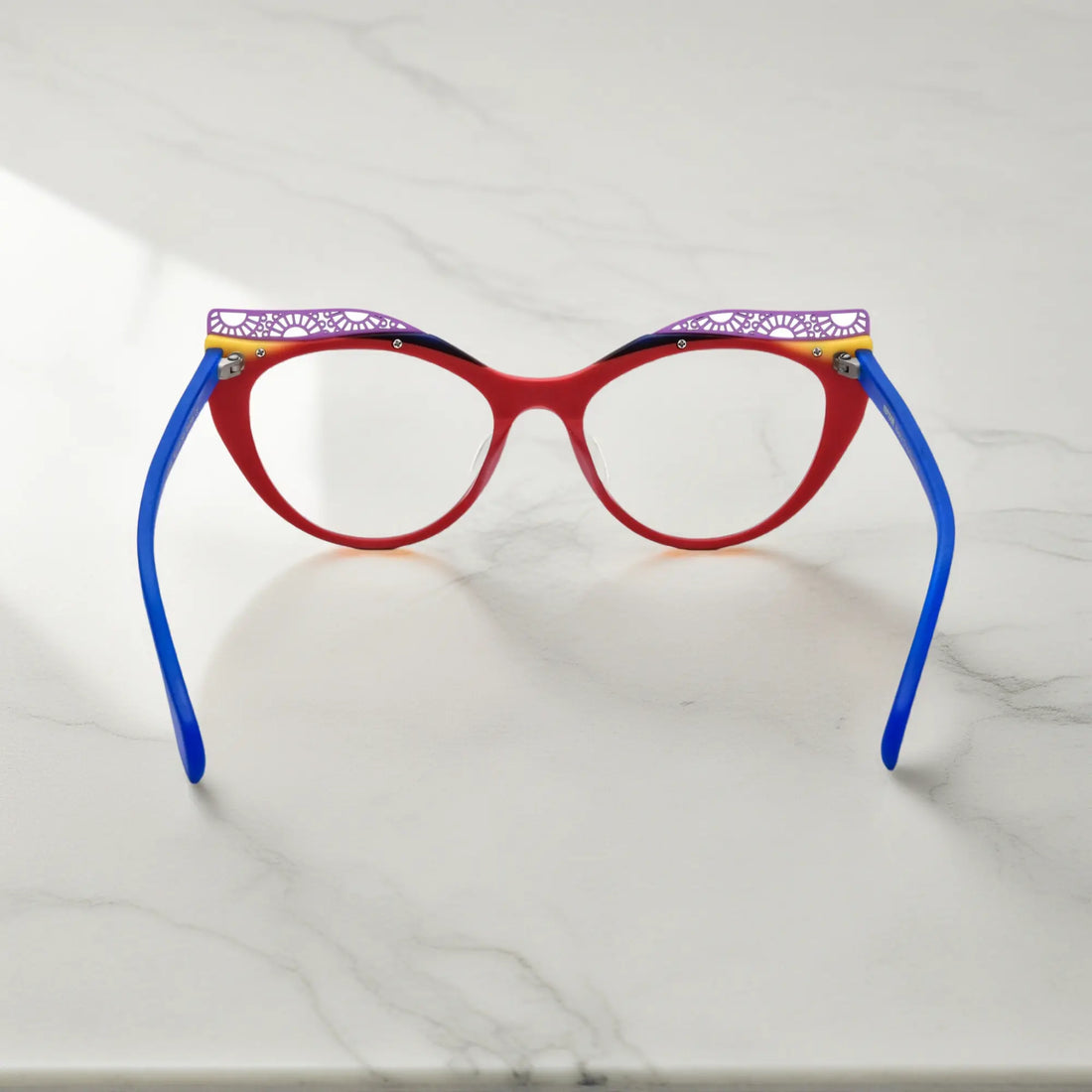 Back View of VoyueLens™ Scarlet Horizon cat-eye eyeglasses with red-to-orange gradient and signature lace-pattern design.