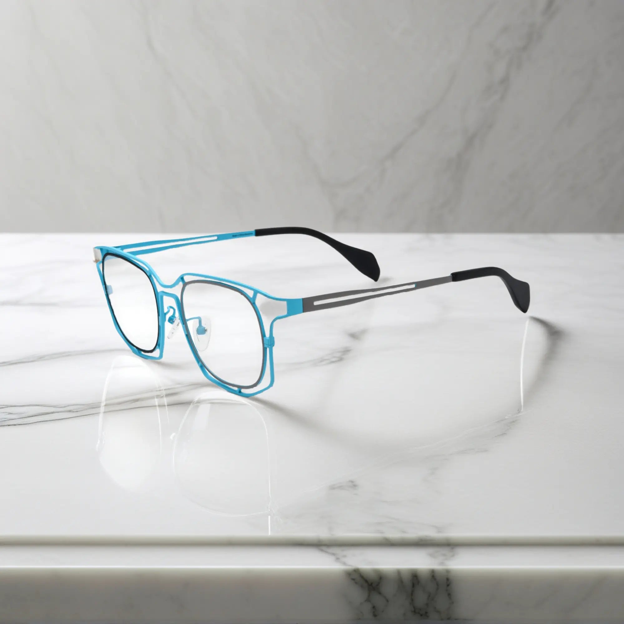 Side view showing temples and blue finish of Sky Blue titanium frame