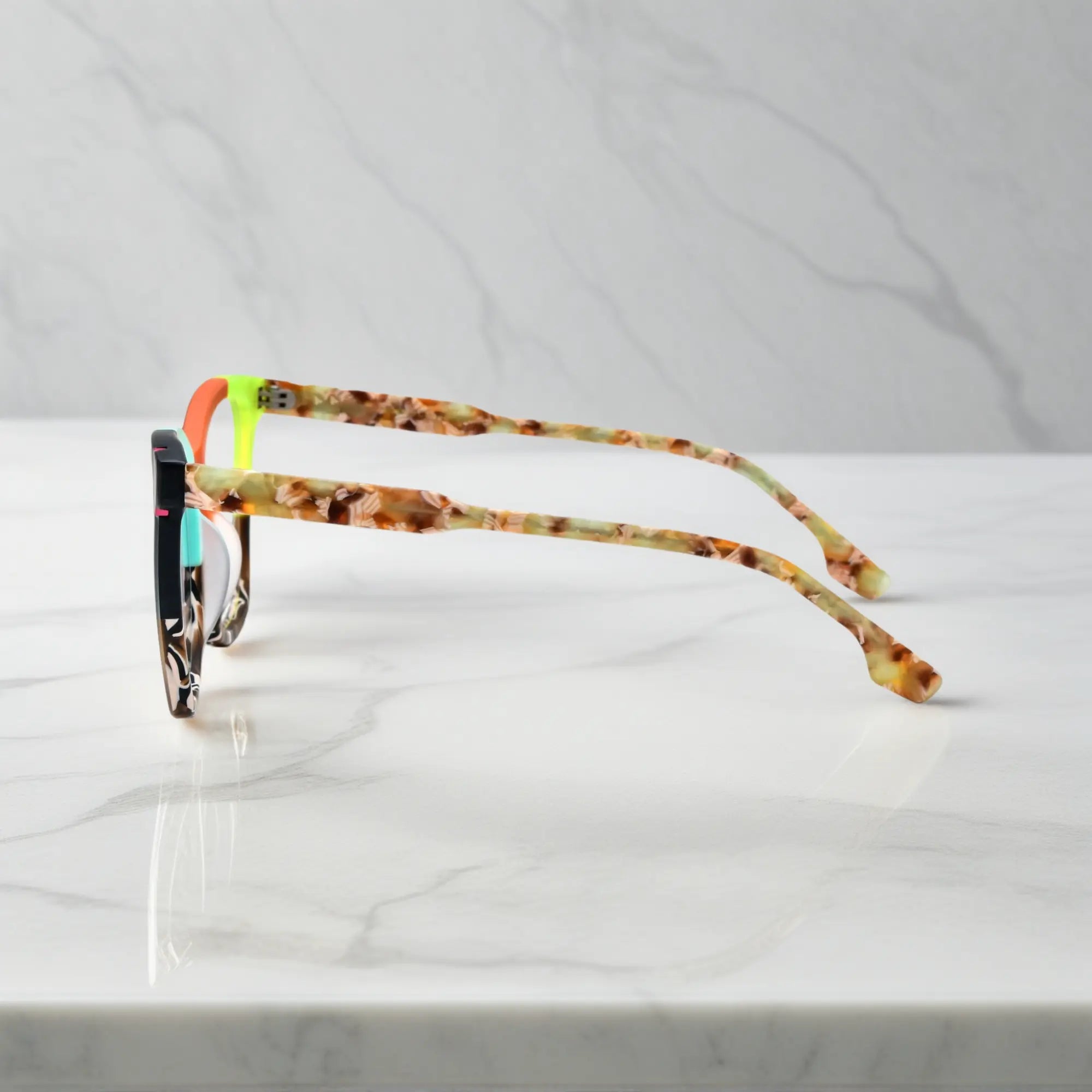 VoyueLens VL19343 Sunset Orange & Teal Mix matte acetate square eyeglasses (unisex) are shown from the side view, highlighting the profile of the colorful matte acetate frame.showing temples