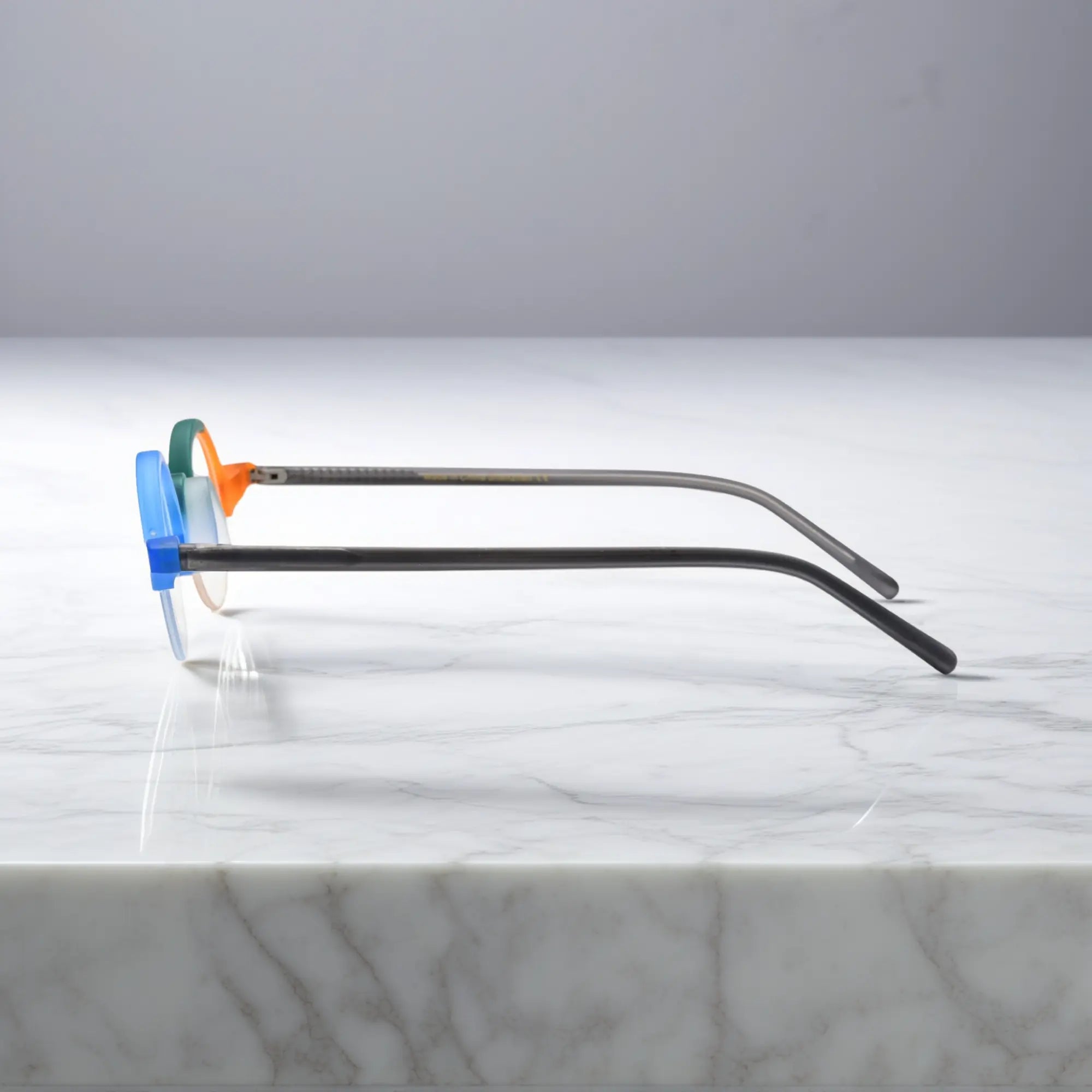 Side reference for VoyueLens™ Teal-Blue semi-rimless browline eyeglasses, showing temples.