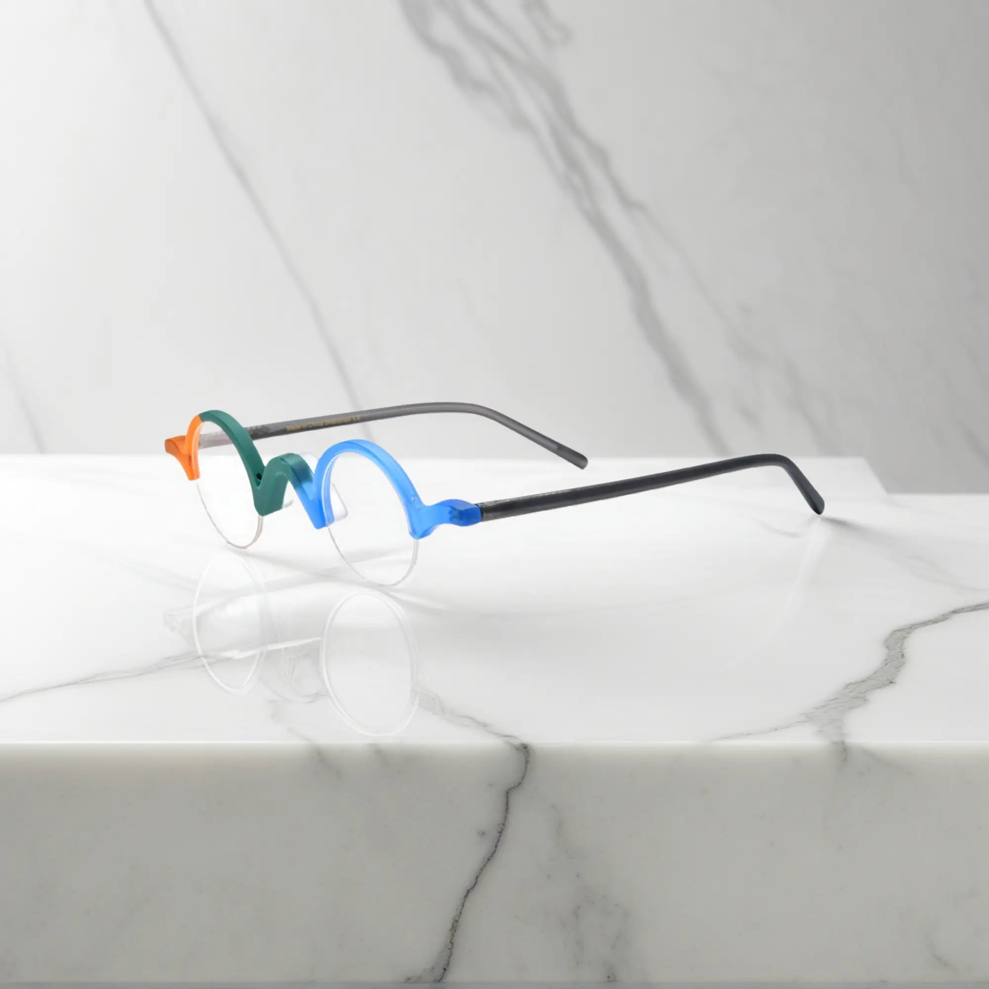 Side profile of VoyueLens™ Teal-Blue semi-rimless browline eyeglasses crafted with matte acetate.
