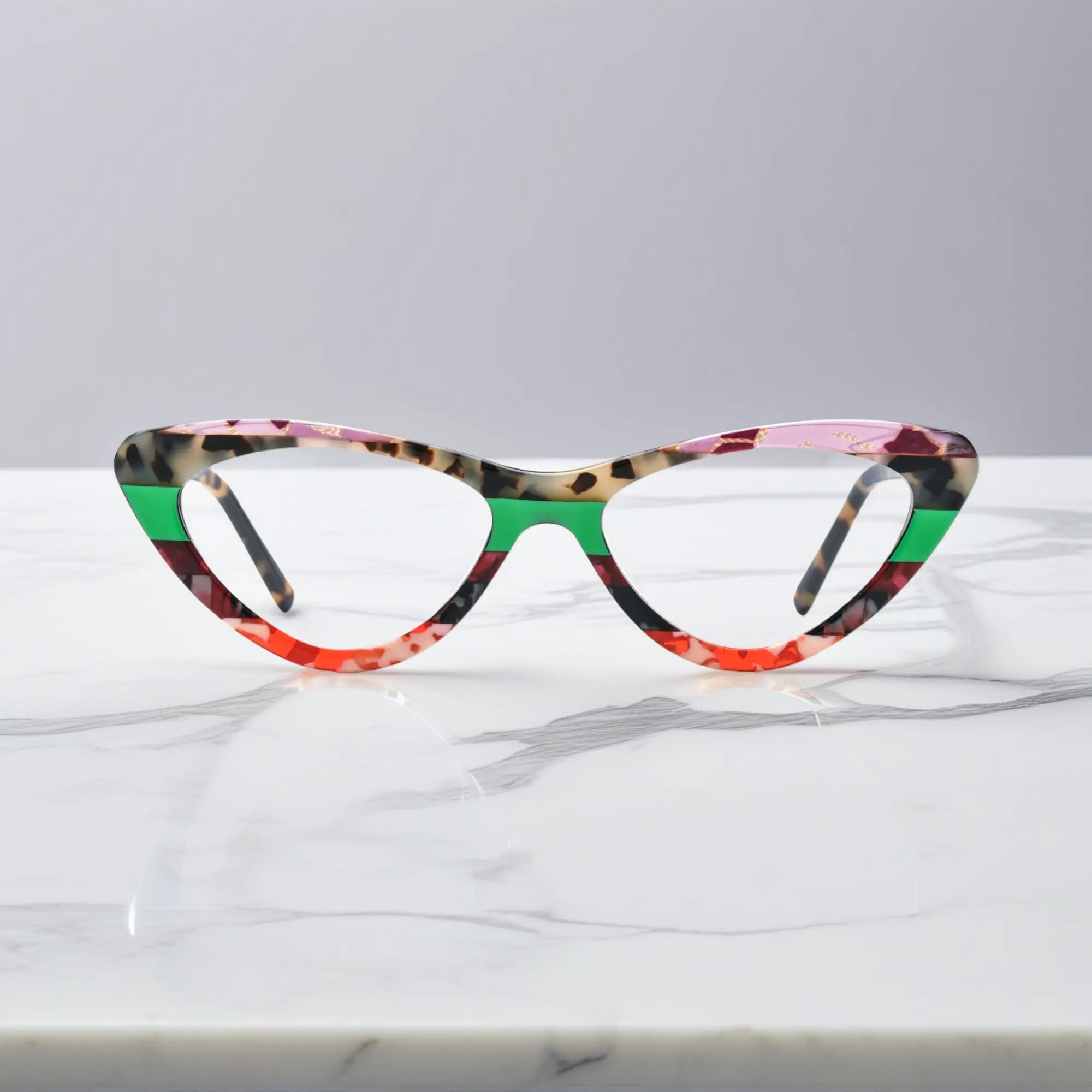 Front view of VoyueLens™ KaleidoCat Tortoiseshell Pop glasses with green stripe and colorful cat-eye frame