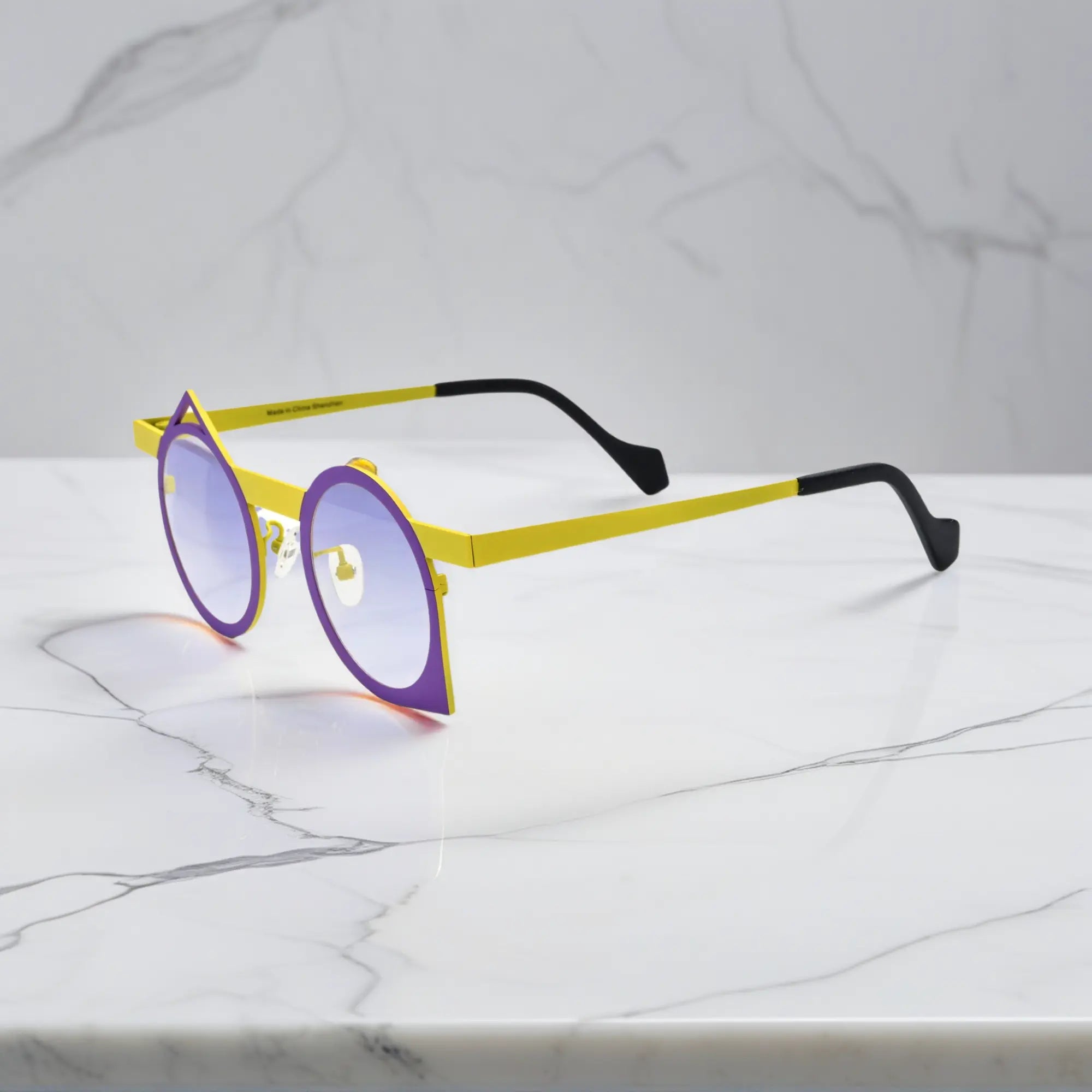 Side view of VoyueLens™ Violet Mustard VL185801 retro eyeglasses made with lightweight titanium and an abstract design.