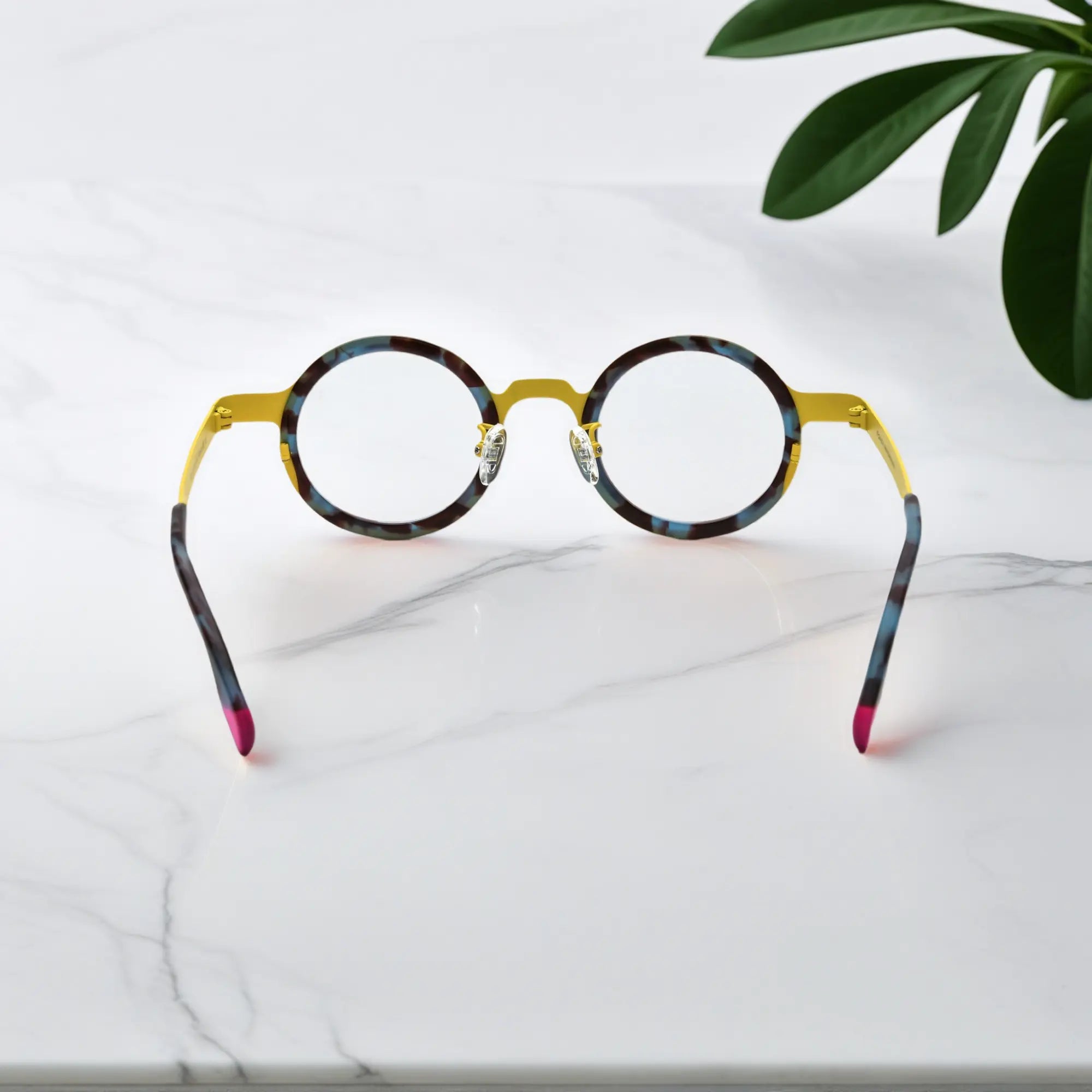 Back view of Sunshine Mirage round eyeglass frame