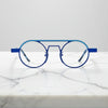 Front view of VoyueLens™ NeoPilot aviator glasses in Glacier Blue icy titanium aviator frame with a cool, futuristic tone