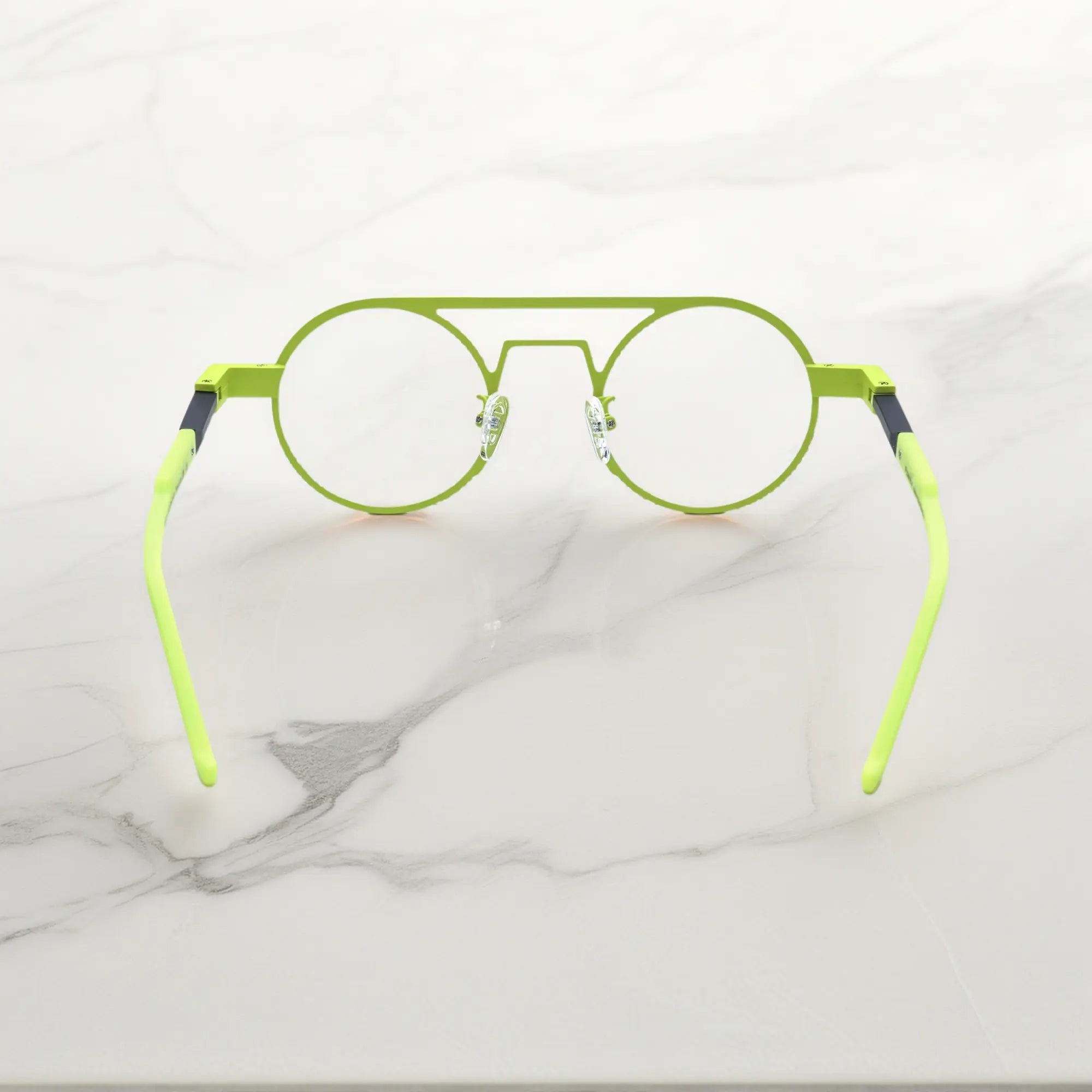 Rear angle displaying the ergonomic nose pads and lightweight design in Neon Moss bold green colorway for statement-making eyewear
