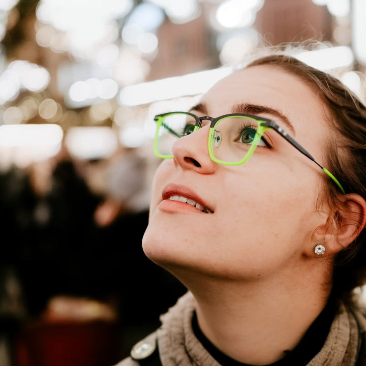 Model wearing VoyueLens™ Neon Mist glasses – urban chic aesthetic