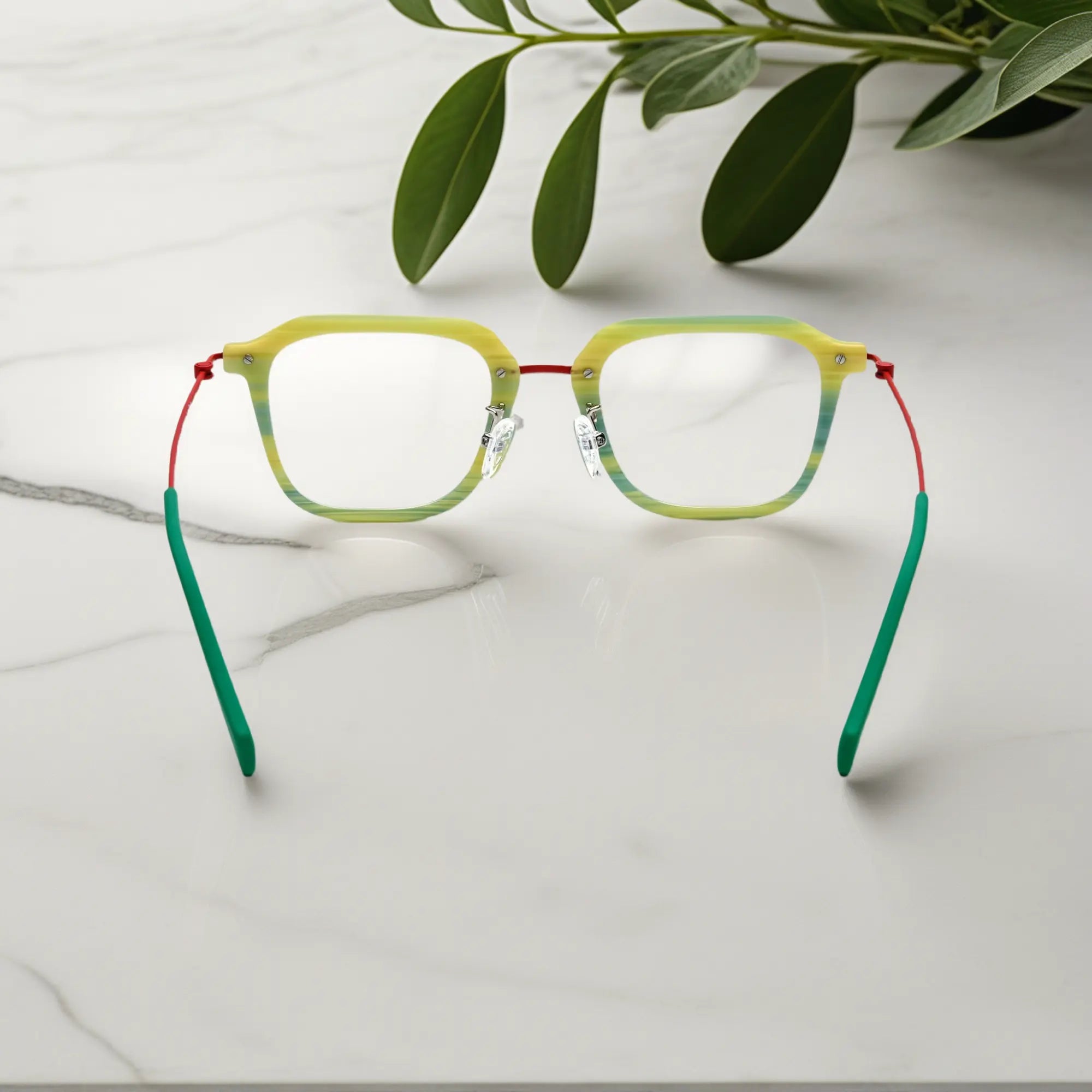 Rear view capturing the flexible titanium arms and bright tones of the Citrus Mist frame.