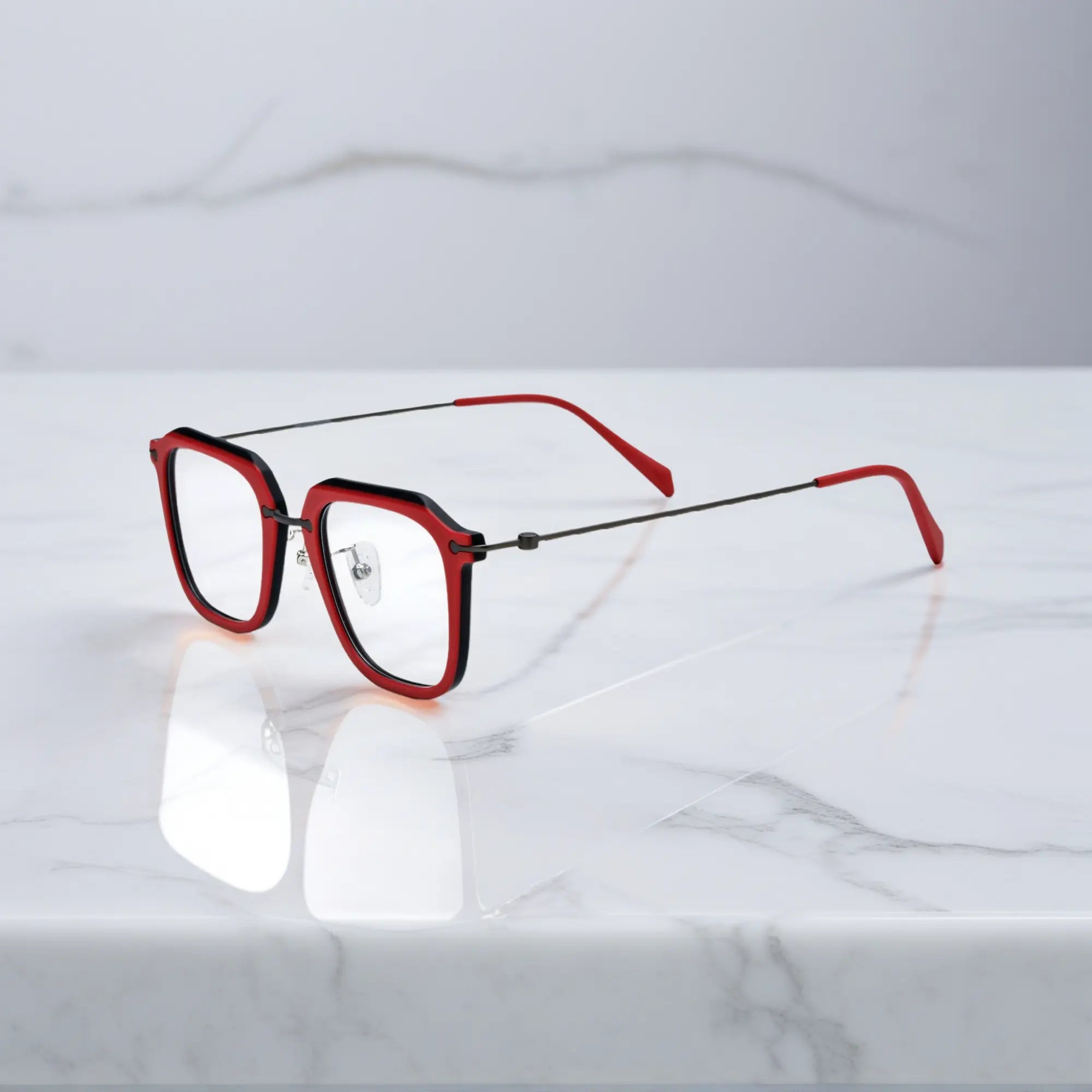 Side shot showing off the contrast between crimson frame and dark titanium temples.
