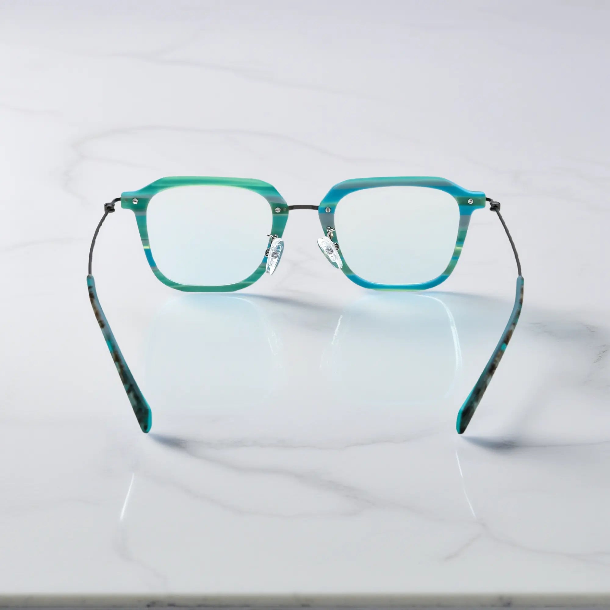 Back view highlighting clean transitions and fresh green-blue color blend.