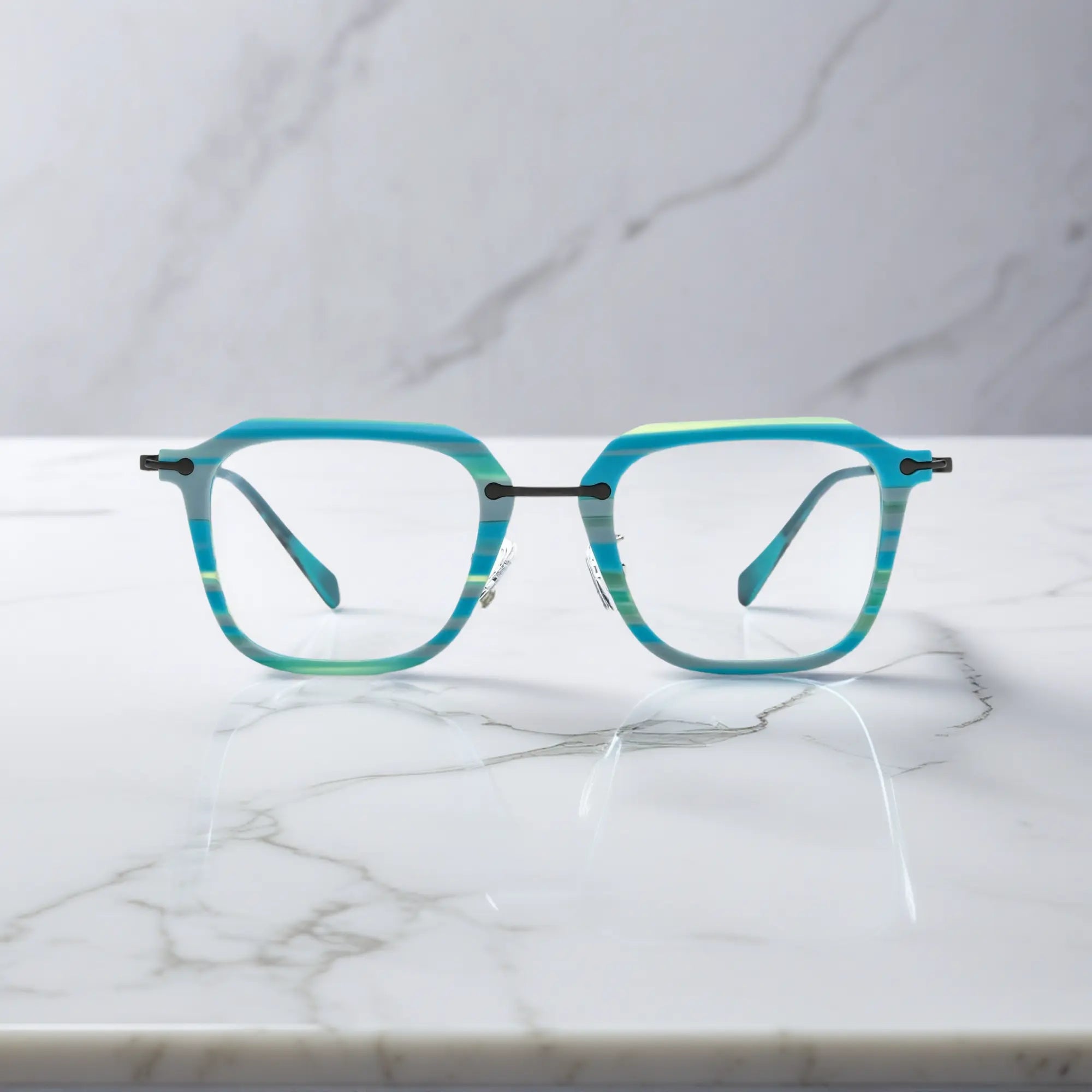 Front angle of Glacier Teal frame with a cool-toned oceanic finish from VoyueLens™.
