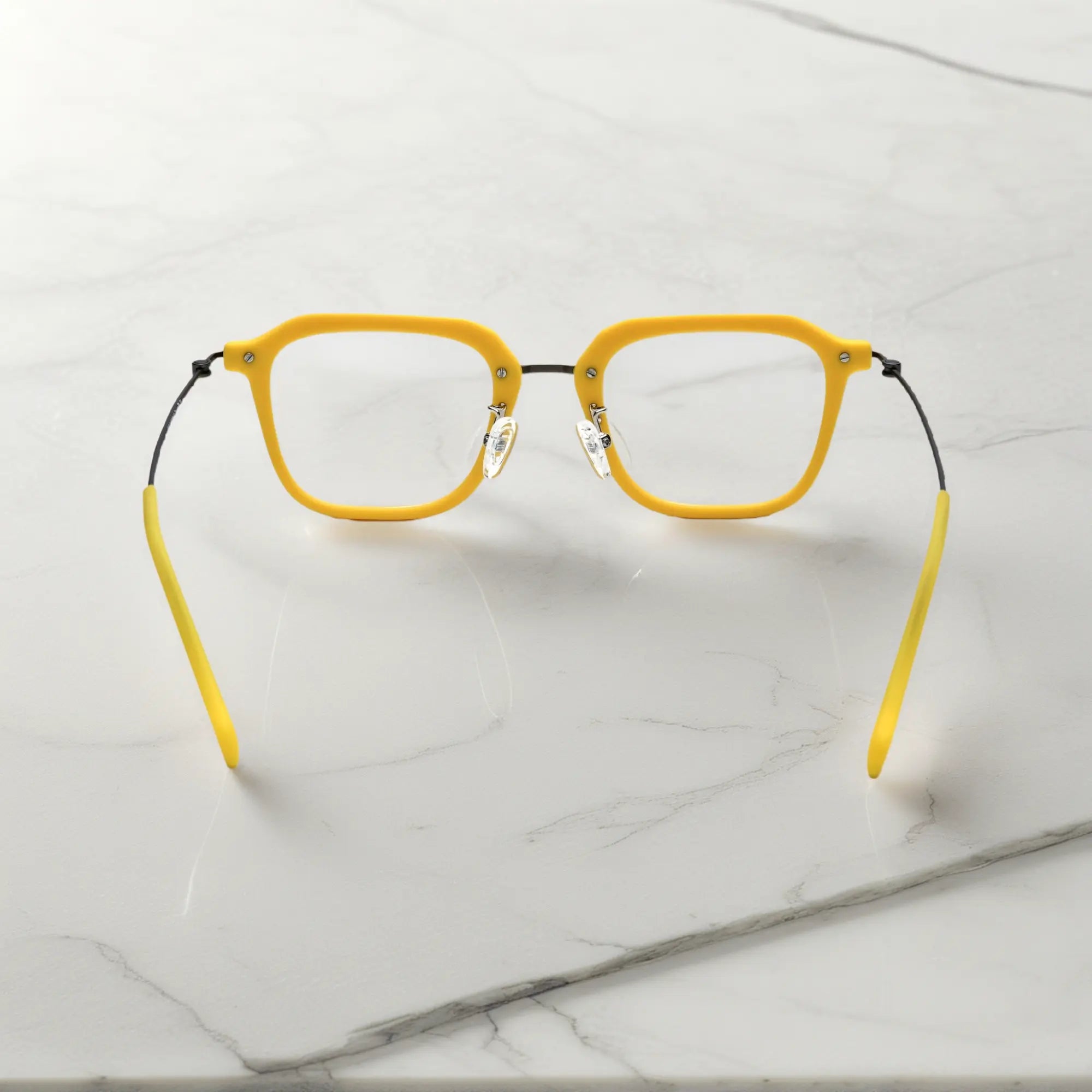 Rear view showing frame structure and cheerful yellow tone of the VoyueLens™ Urban Vision glasses.