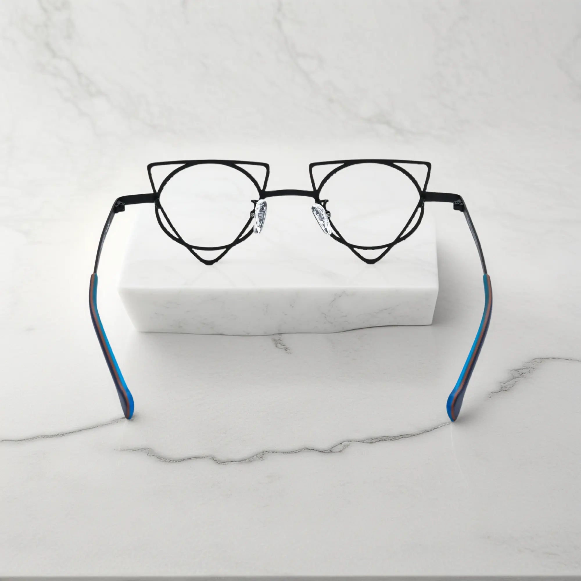 Back angle revealing artistic frame curves of VoyueLens™ Lime Black geometric glasses, crafted from lightweight titanium