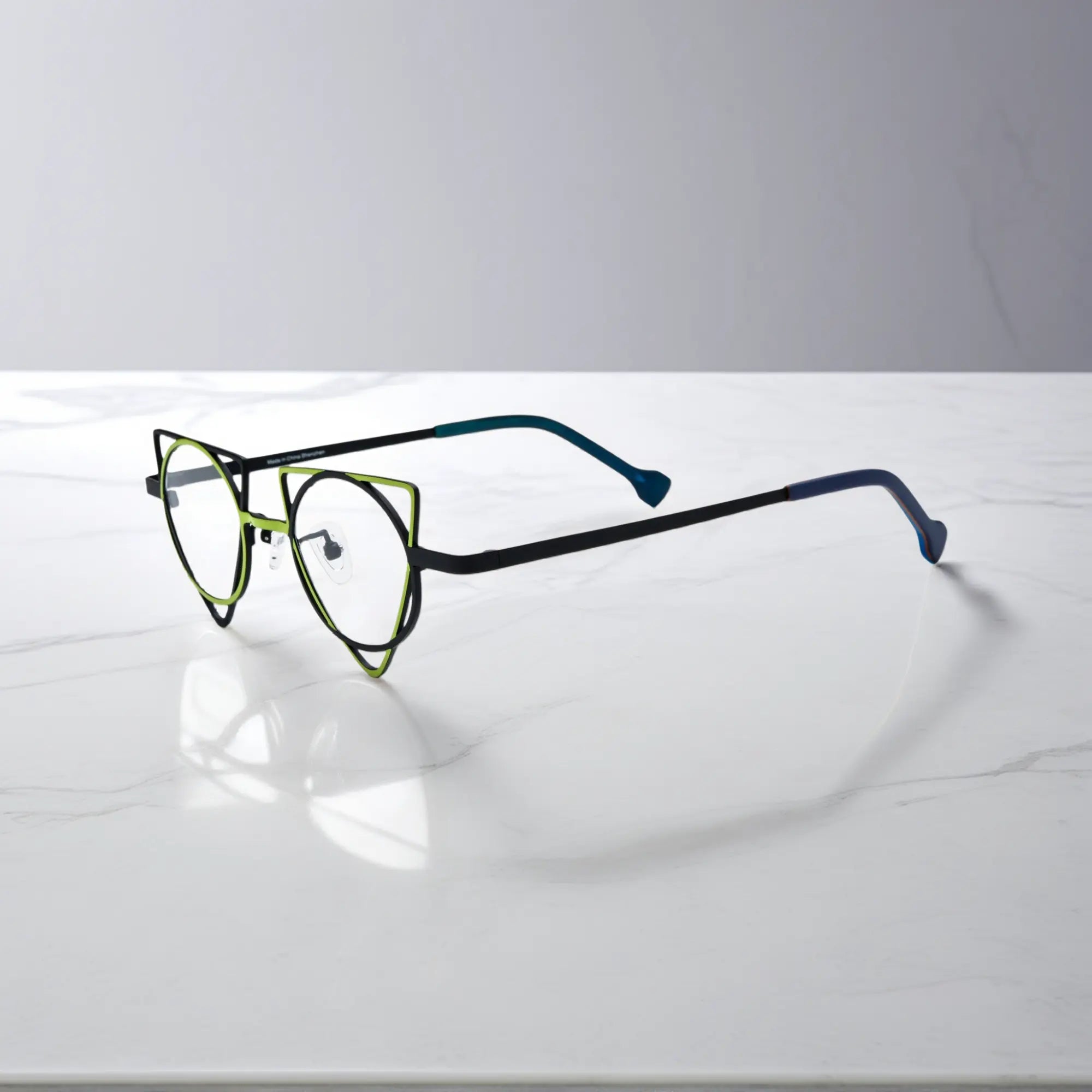 Side profile showing slim titanium temples of VoyueLens™ Lime Black designer eyeglasses, ideal for modern optical styling