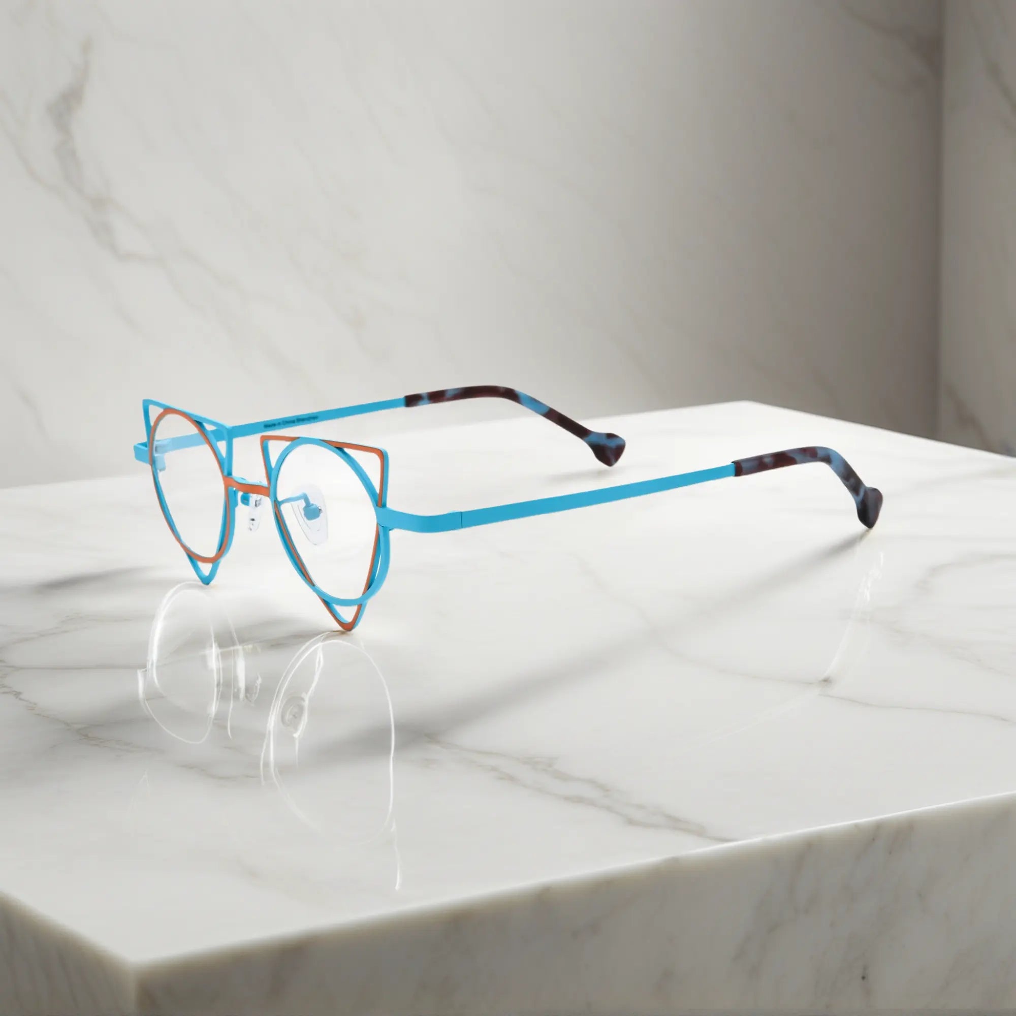 Side profile showing slim titanium temples of VoyueLens™ Tangerine Blue designer eyeglasses, ideal for modern optical styling