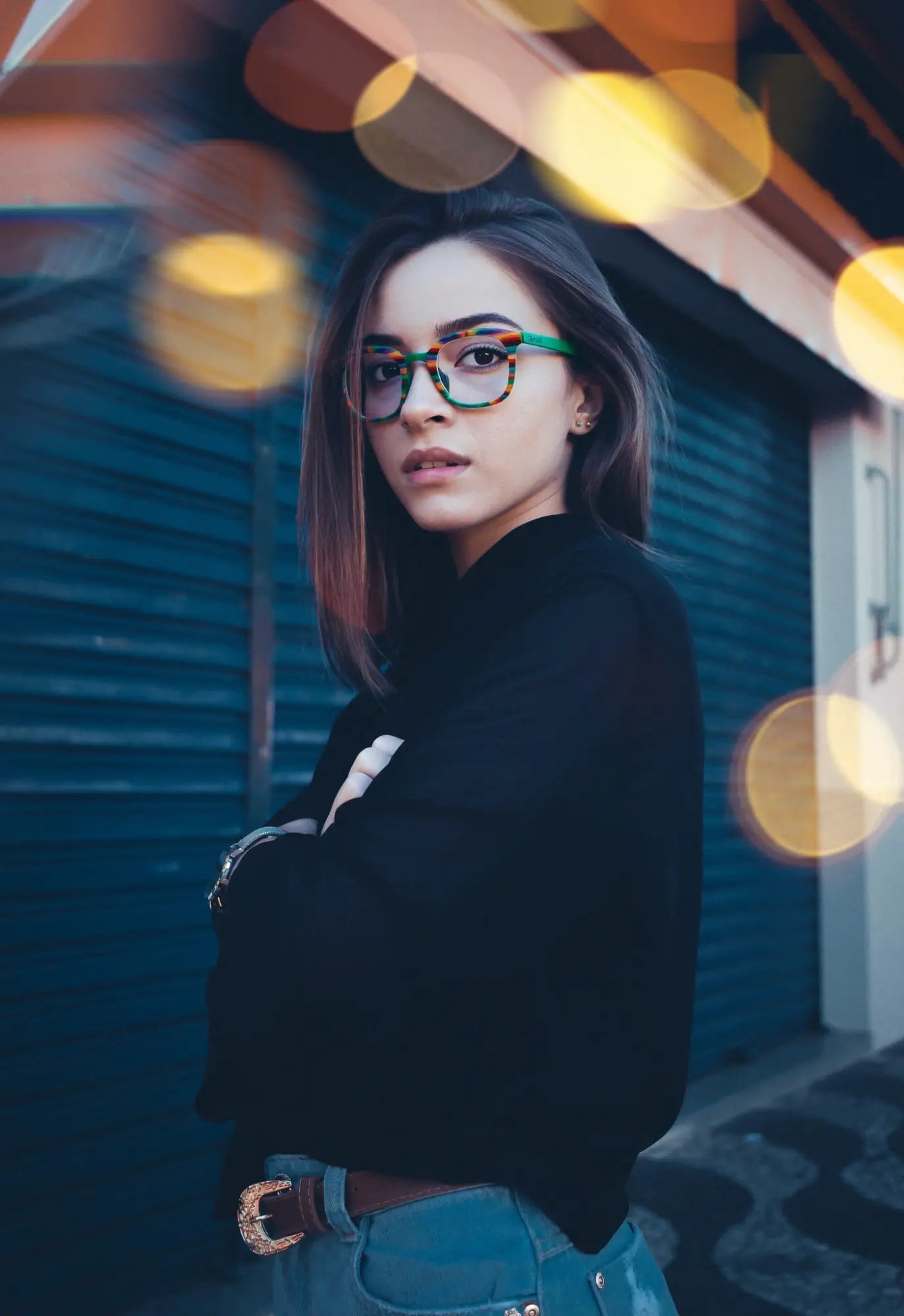 Model wearing VoyueLens™ Aurora Stripe square eyeglasses with a green-to-clear gradient acetate front and satin titanium temples.