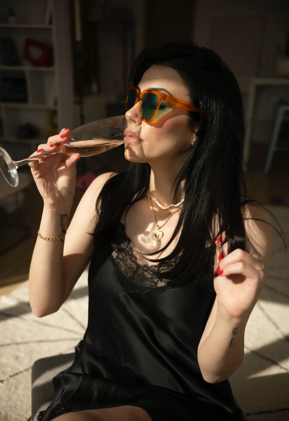 lifestyle image of model wearing VoyueLens™ amber yellow square sunglasses for weekend fashion style