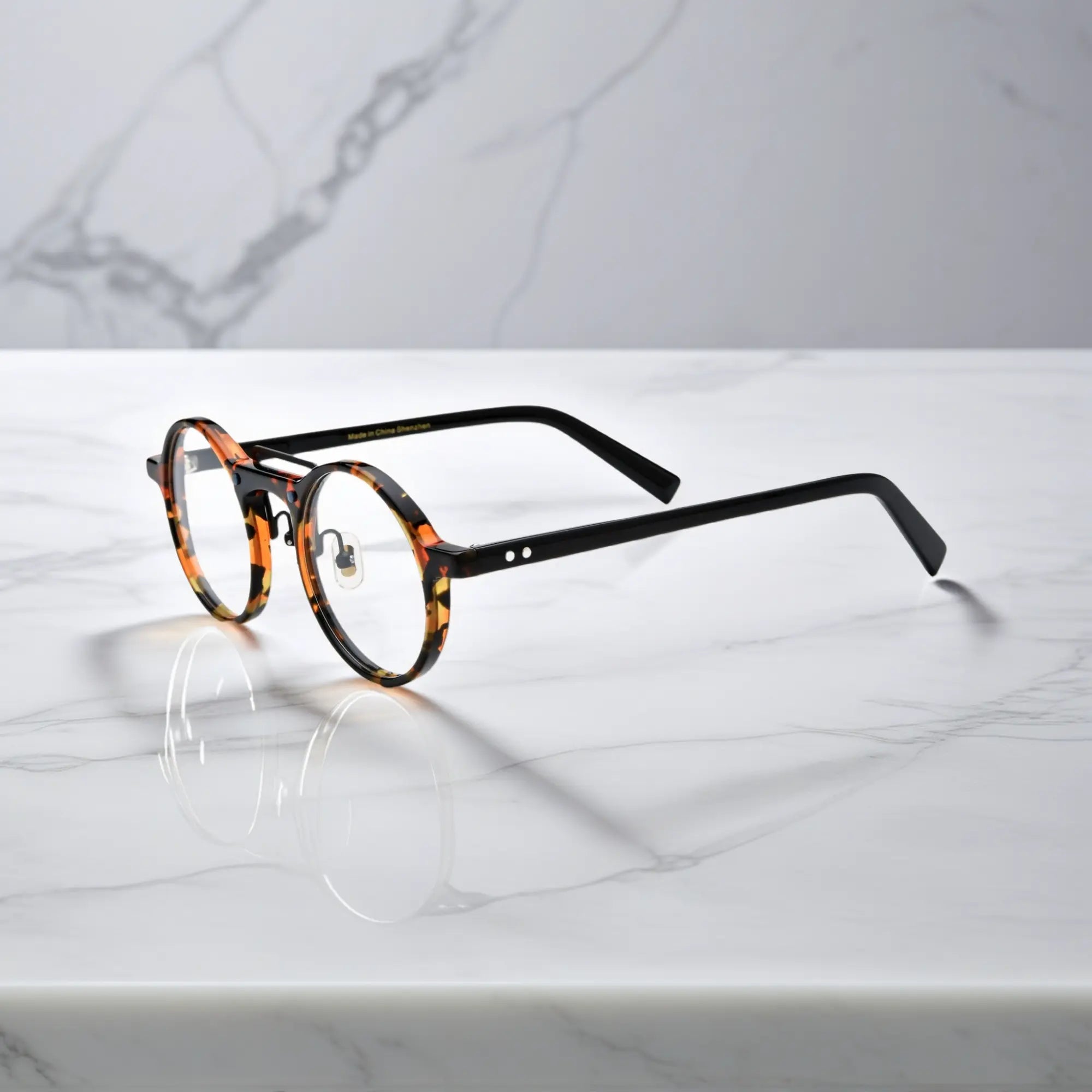 Side view of VoyueLens? VL19194-C1 Black Tortoise eyeglasses showing lightweight temple arms and adjustable nose pads