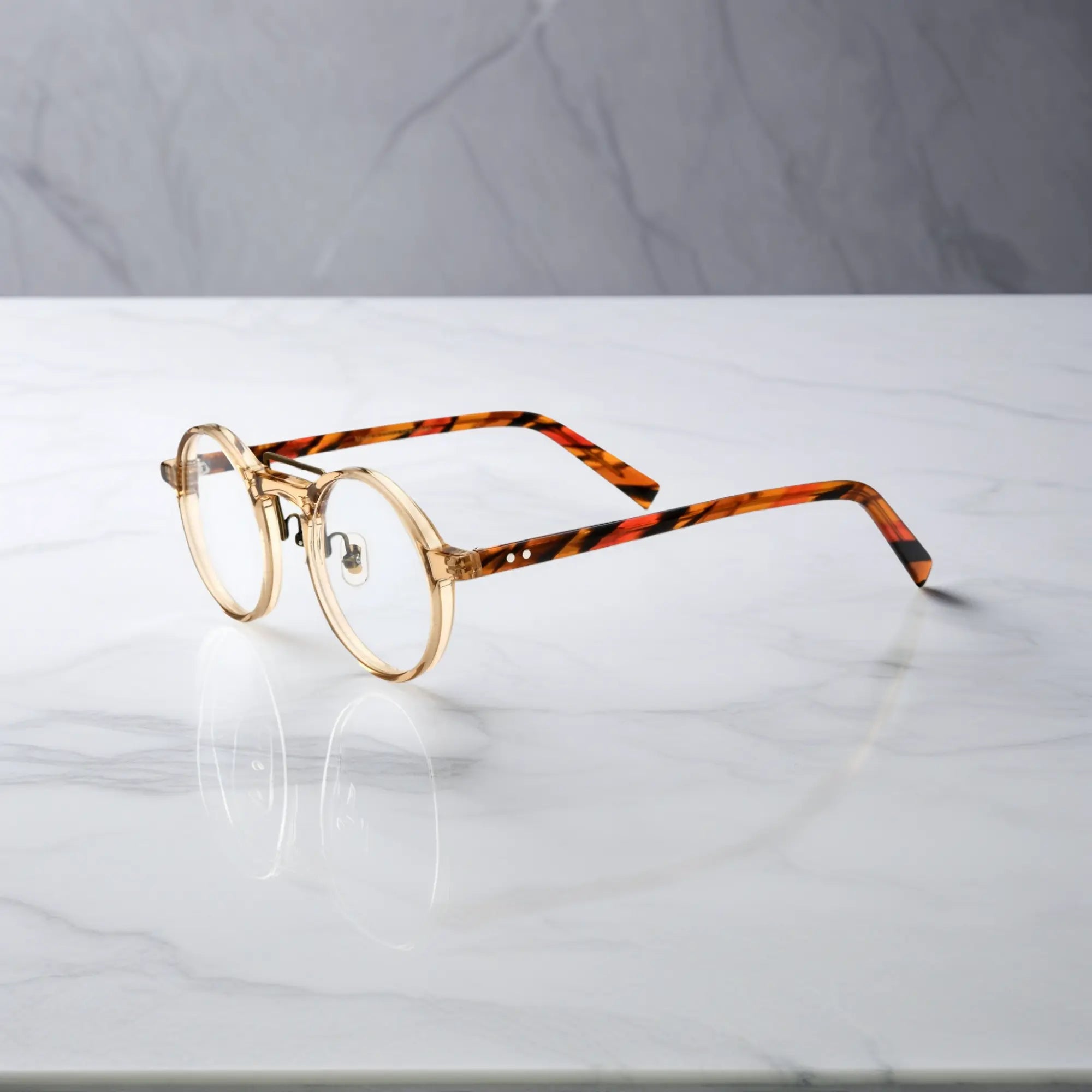 Side profile of VoyueLens™ VL19194-C2 Champagne Gold eyeglasses highlighting slim temple design and soft nose pads