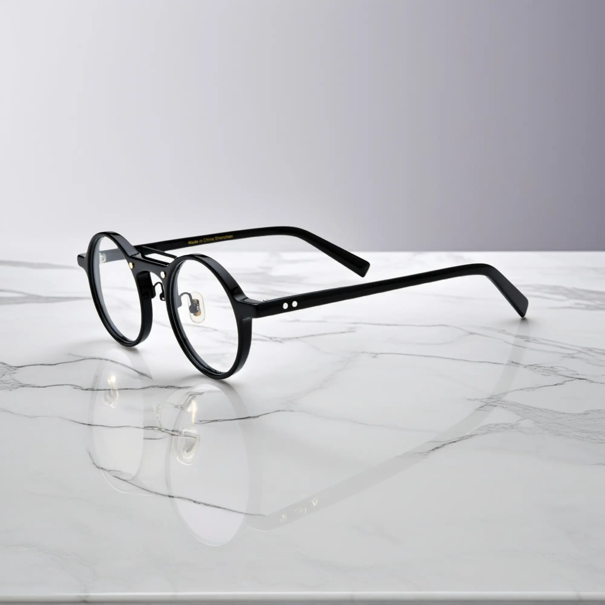 VoyueLens? VL19194-C4 Black round eyeglasses side profile view with flexible metal hinge detail