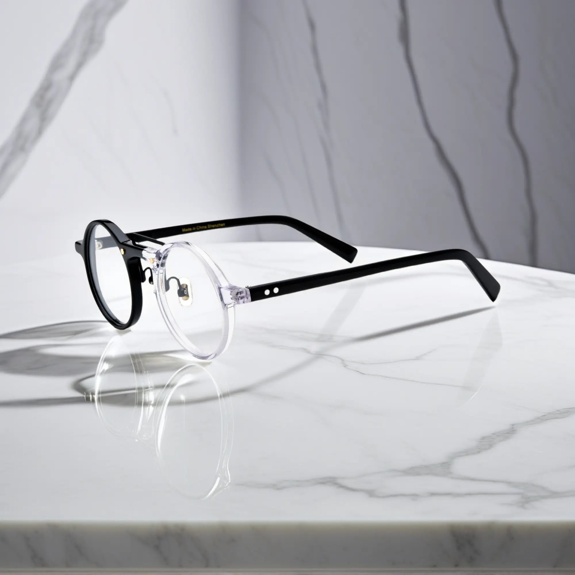 Side shot of VoyueLens™ VL19194-C5 Black-Clear acetate round eyeglasses showcasing nose pad design