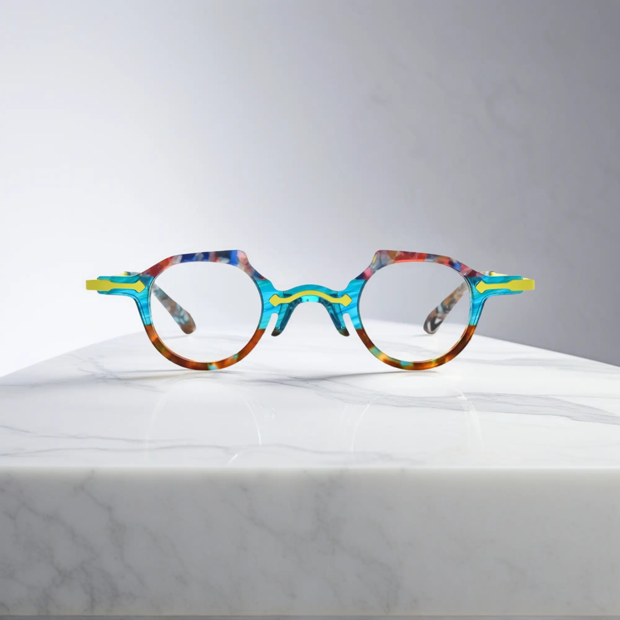 Front-facing view of VoyueLens™ VL19341 glasses in a translucent amber crystal acetate frame, showcasing the round lens shape and glossy finish for a warm and modern look.