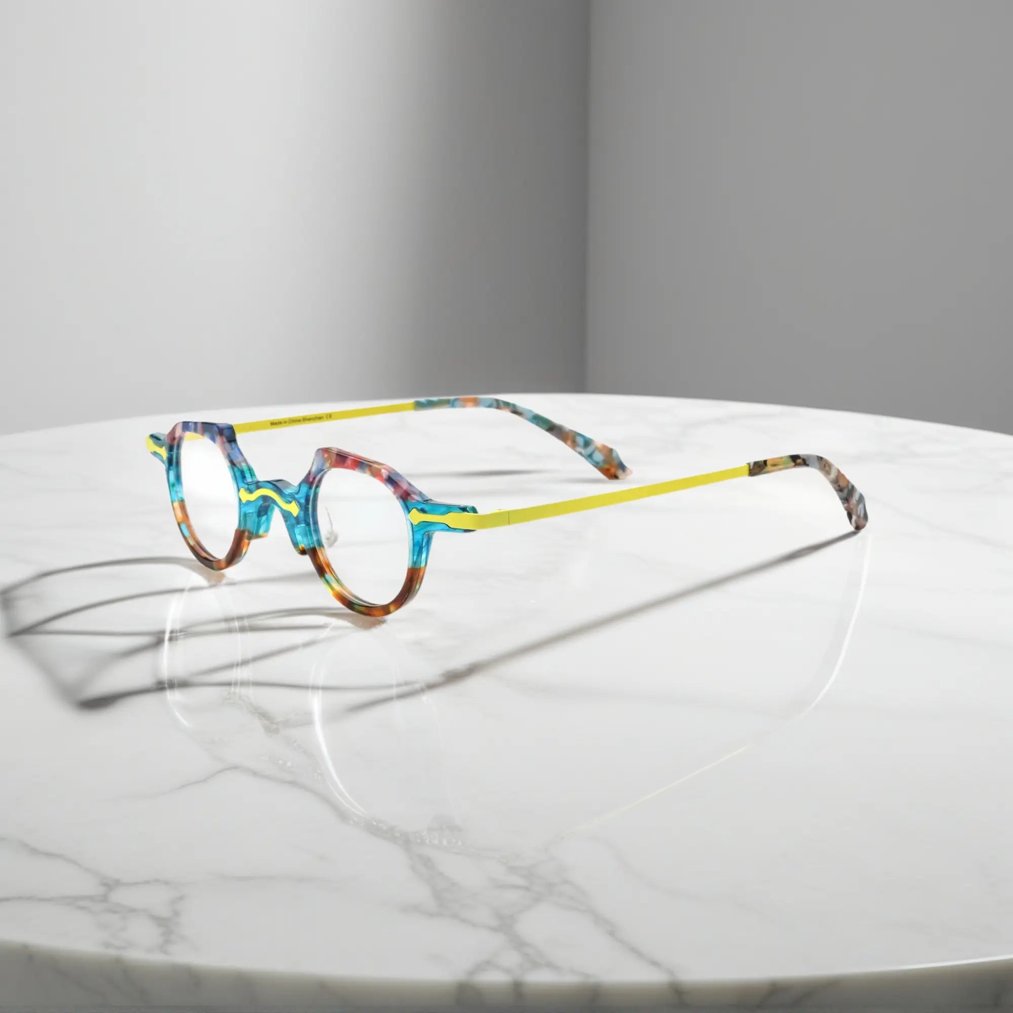 Side view of VoyueLens™ VL19341 lightweight eyeglasses in amber crystal acetate, featuring slim gold metal temples and integrated nose pads for comfortable daily wear.