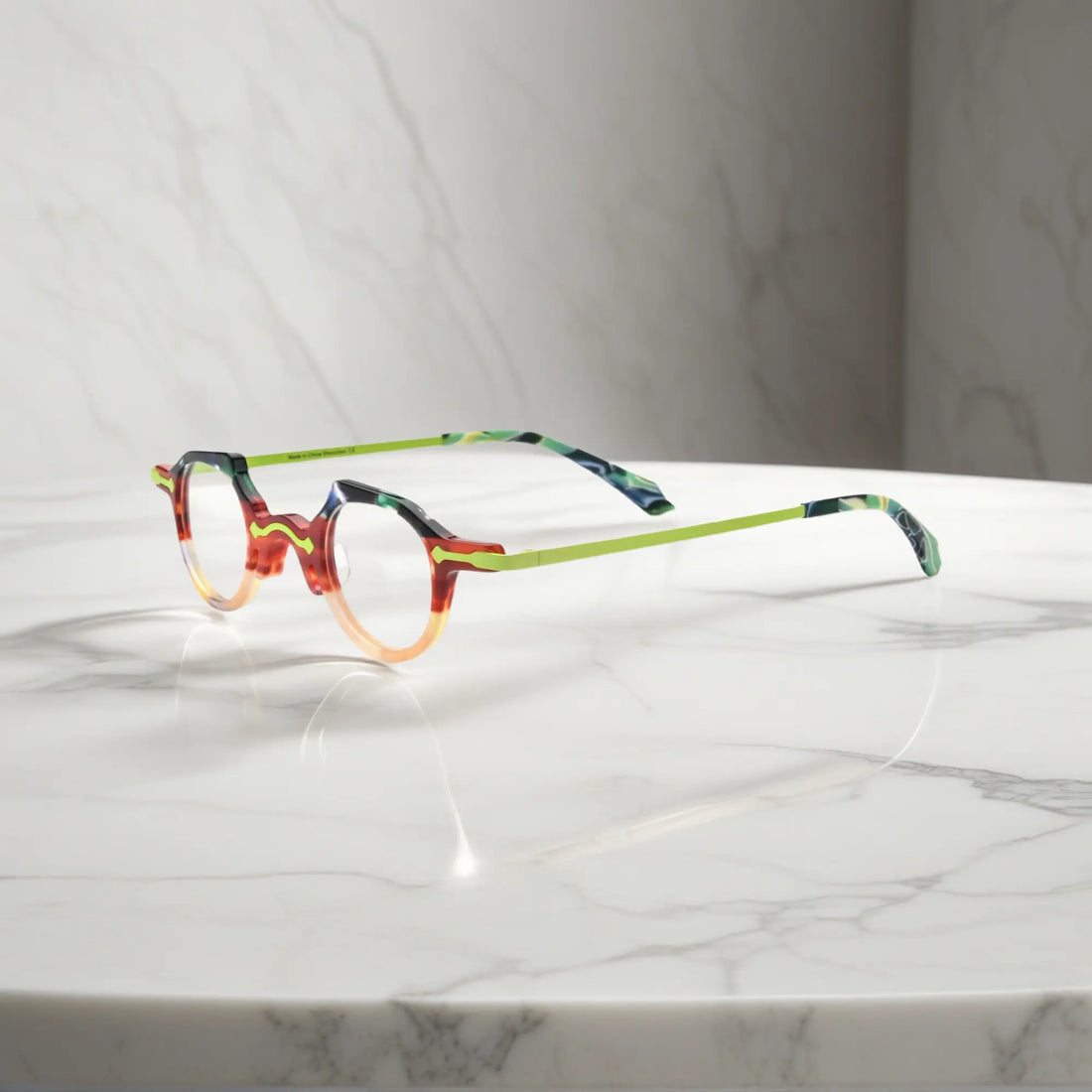 Profile view of champagne-clear VL19341 glasses showing fine metal temples and see-through soft-tone frame.