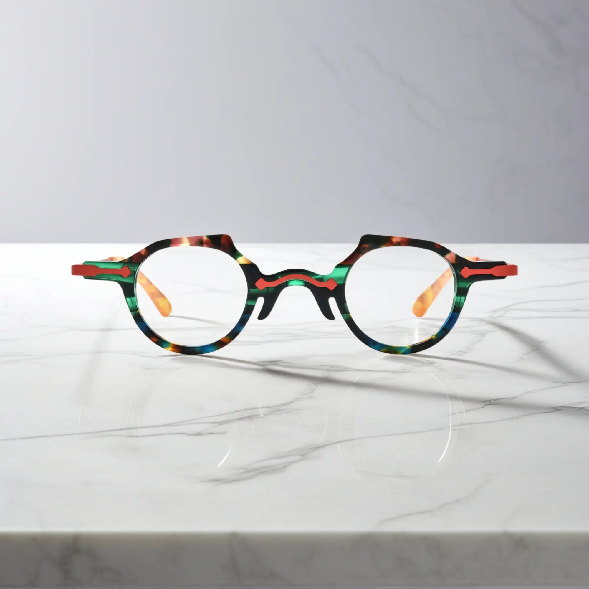 Front view of VoyueLens™ VL19341 glasses in green flame tortoise acetate, combining deep green with red and amber streaks for bold styling.