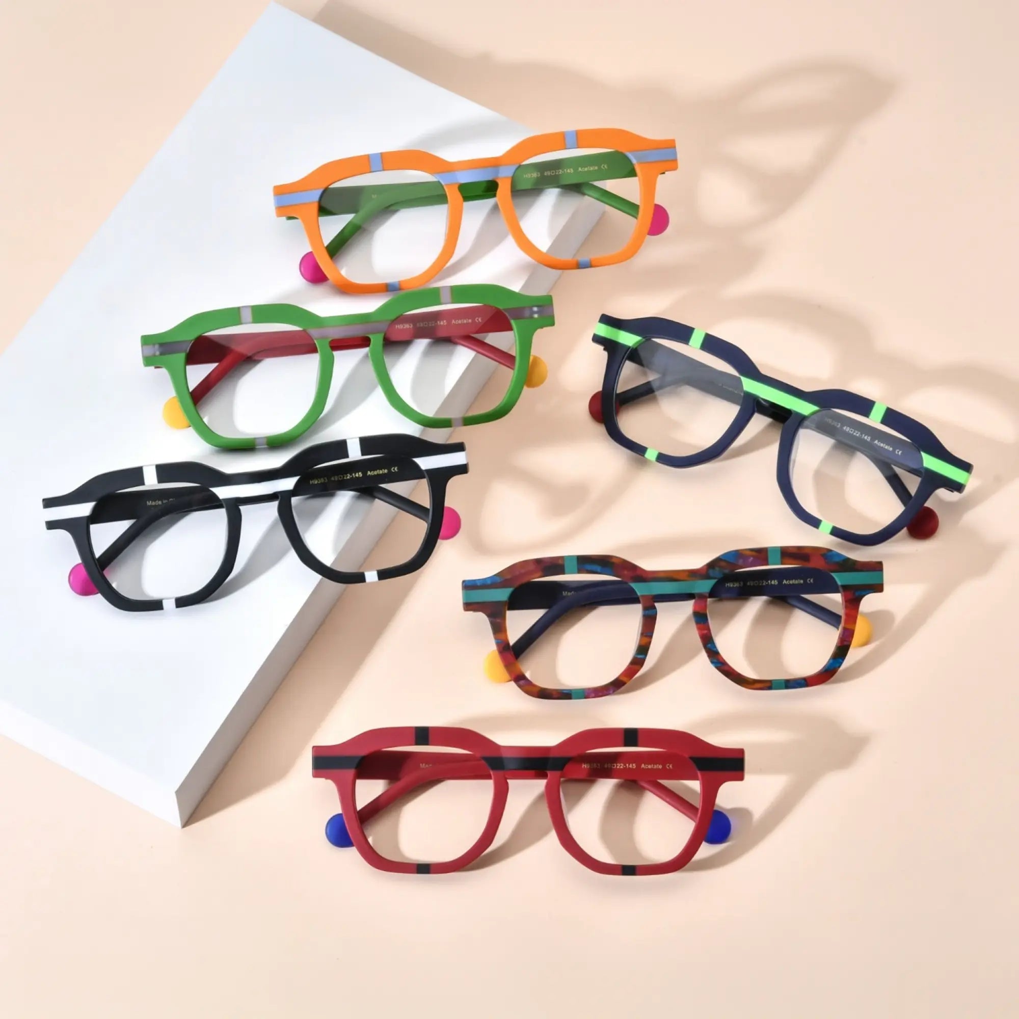 Group photo of VoyueLens™ VL19363 Urban Pop Eyeglasses showcasing all six bold color variants including Citrus Pop, Lime Blaze, Charcoal Stripe, Navy Bolt, Tortoiseshell Flash, and Crimson Impact – vibrant full-rim acetate frames in contrast-block style.