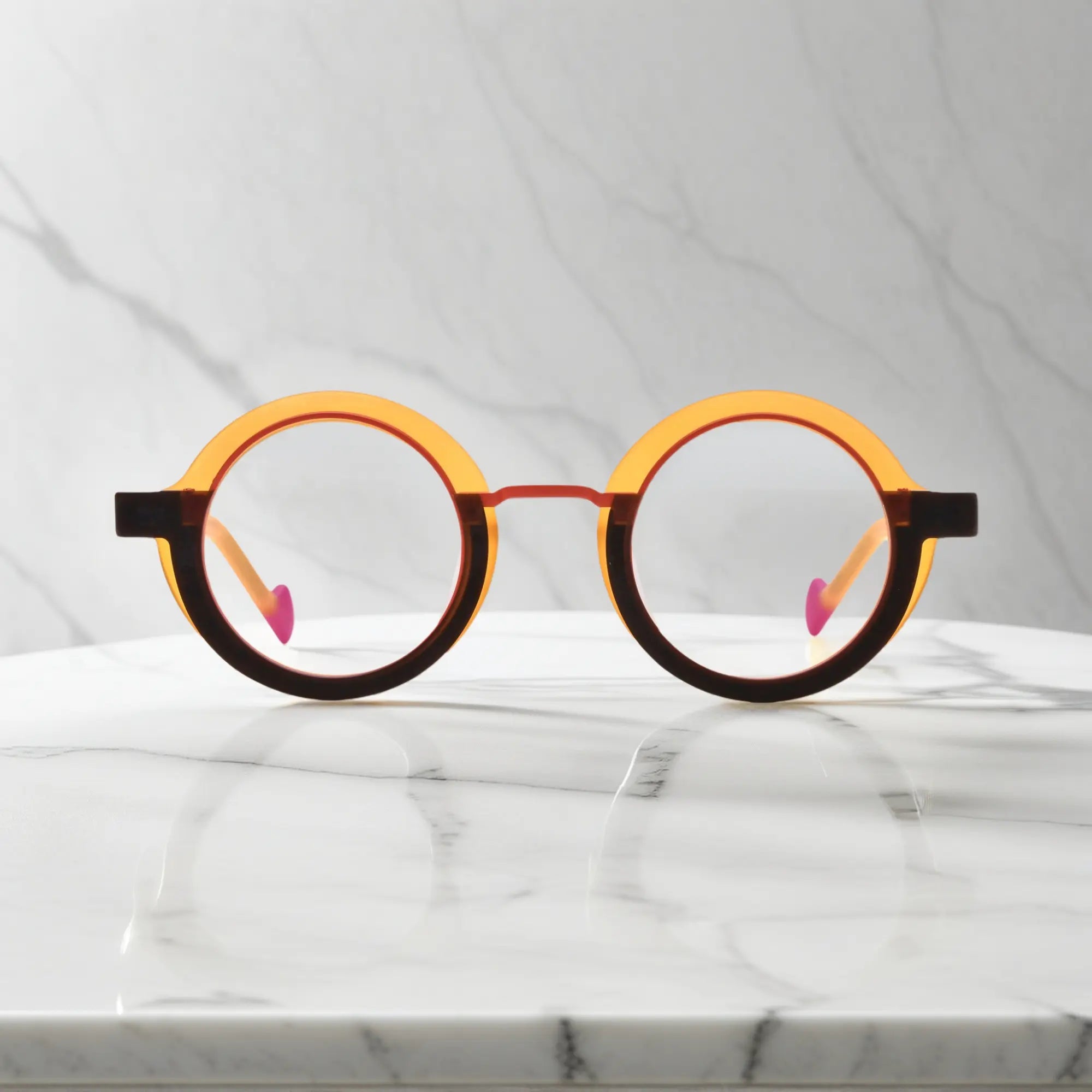 Front view of VoyueLens™ Chromatic Orbit Eyeglasses in Citrus Orbit showcasing its bold round silhouette and vibrant color scheme.