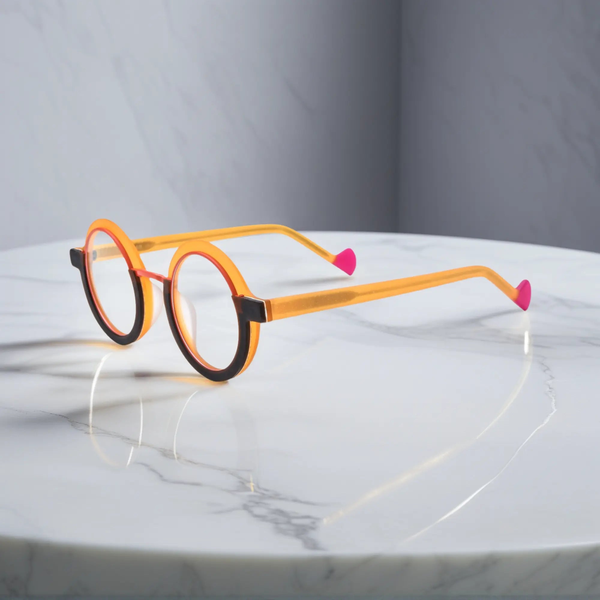 Side angle of VoyueLens™ eyeglass frames in Citrus Orbit highlighting temple structure and artistic design.