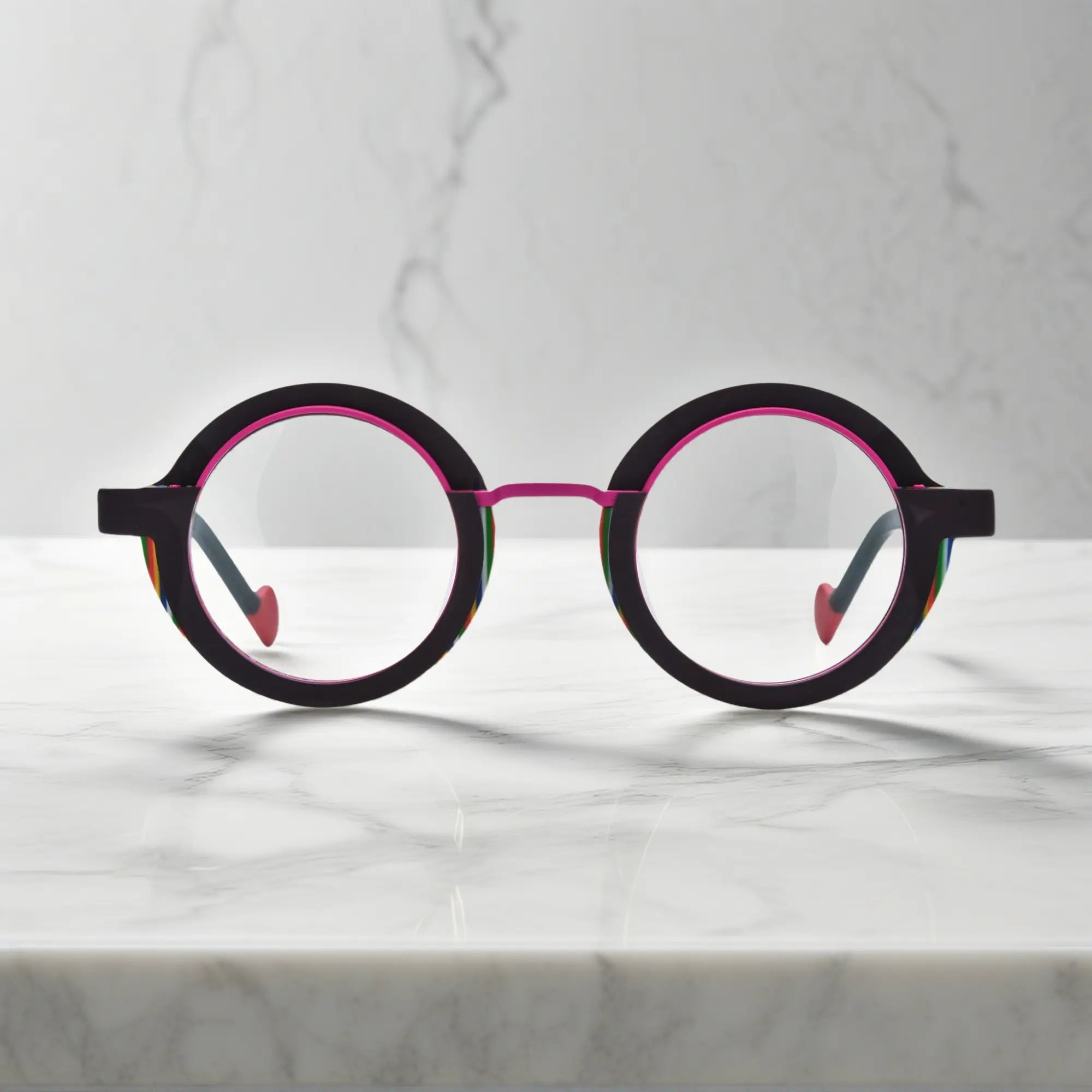 Front view of VoyueLens™ Chromatic Orbit Eyeglasses in Crimson Edge showcasing its bold round silhouette and vibrant color scheme.