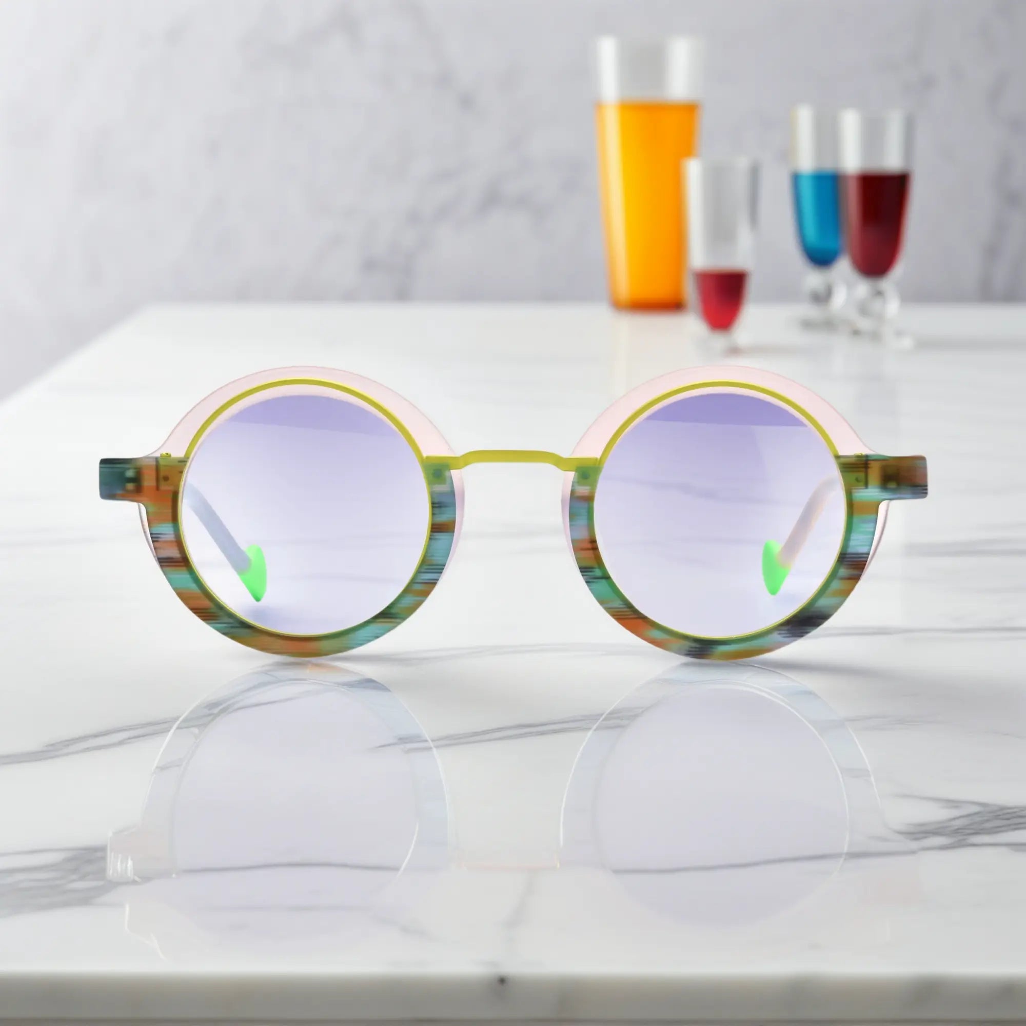 Front view of VoyueLens™ Chromatic Orbit Eyeglasses in Lilac Bloom showcasing its bold round silhouette and vibrant color scheme.