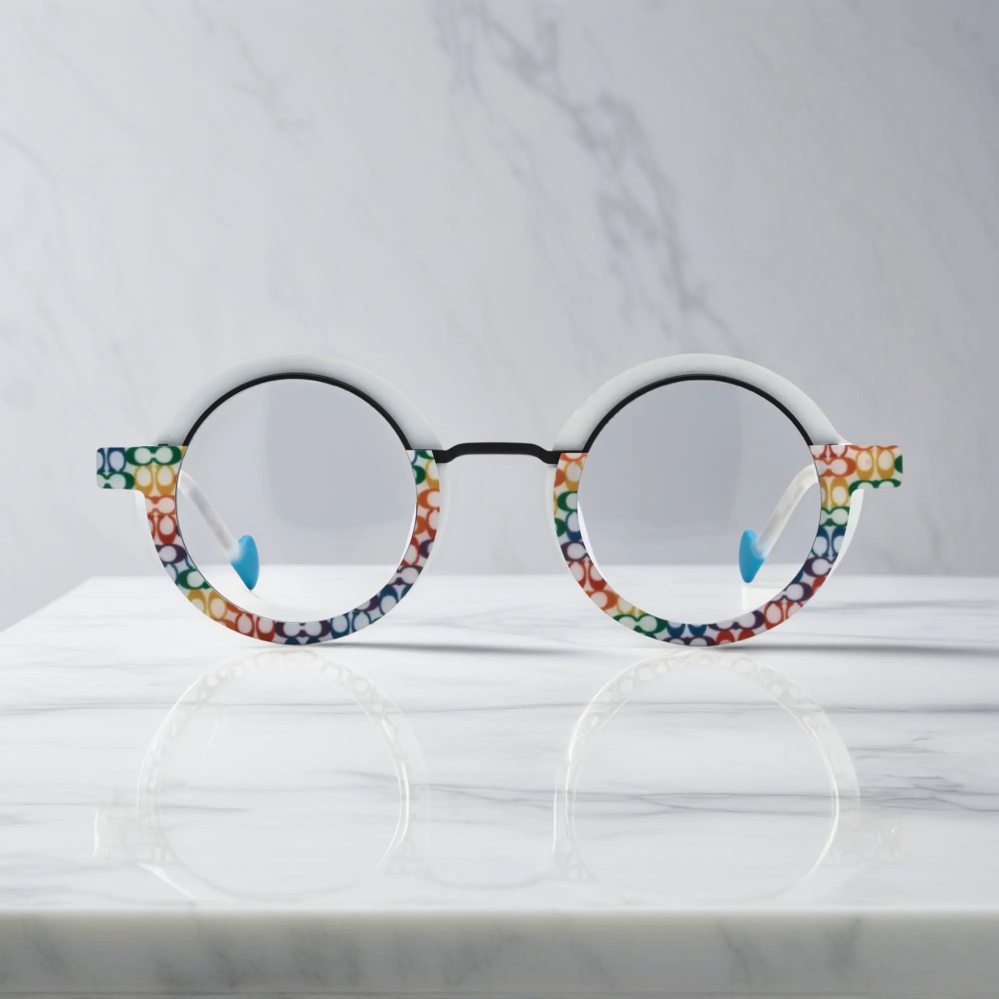 Front view of VoyueLens™ Chromatic Orbit Eyeglasses in Mosaic Frost showcasing its bold round silhouette and vibrant color scheme.
