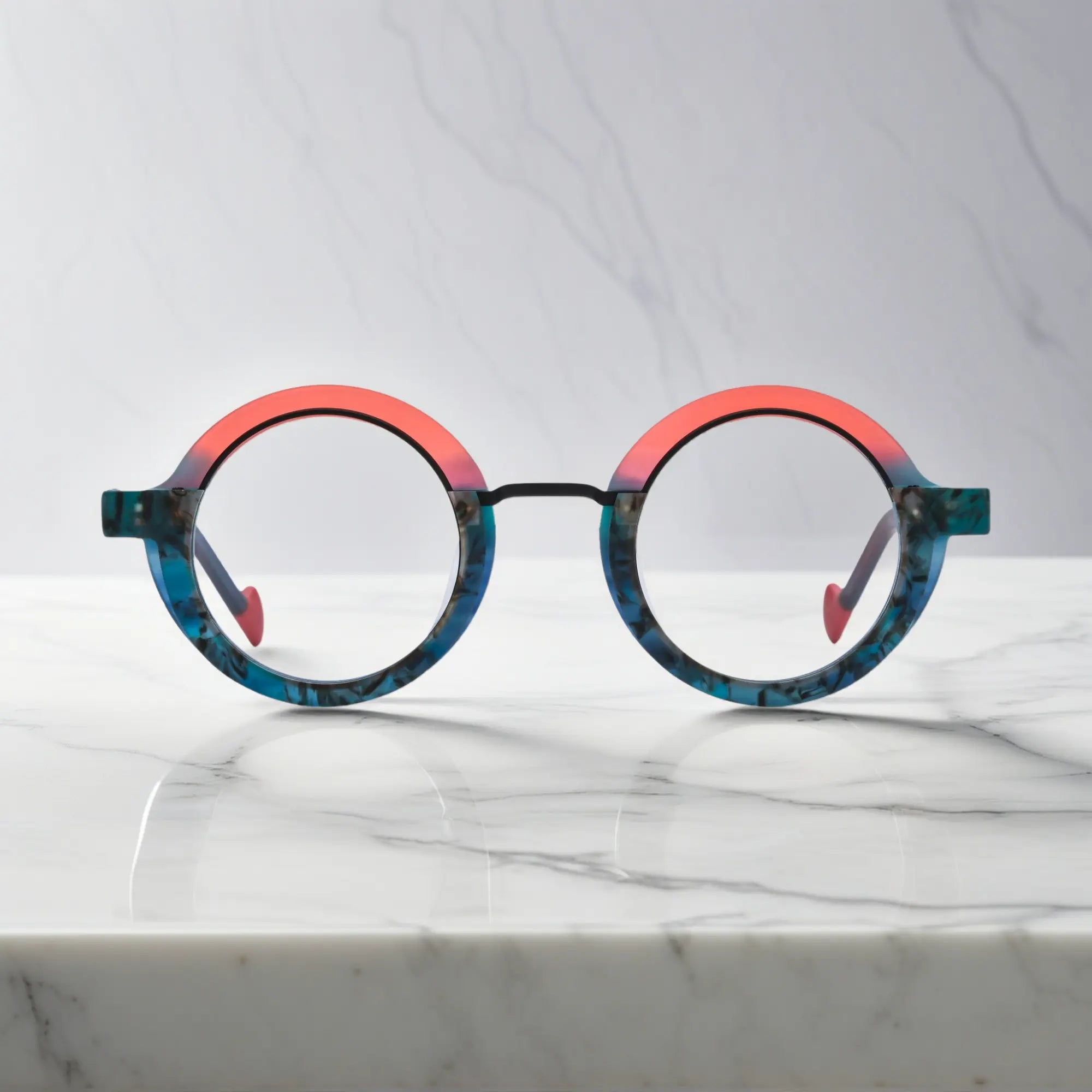 Front view of VoyueLens™ Chromatic Orbit Eyeglasses in Ocean Blaze showcasing its bold round silhouette and vibrant color scheme.
