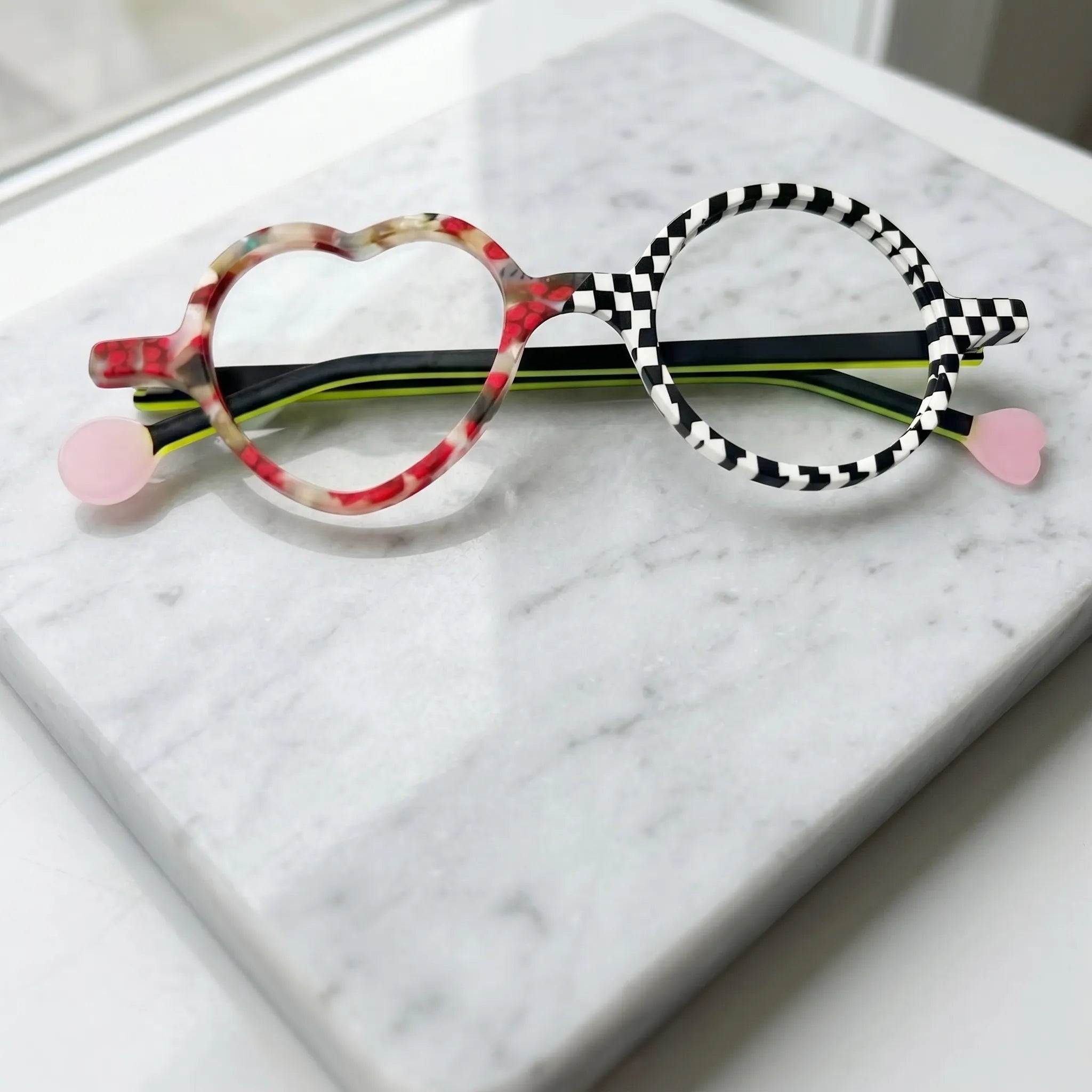 eyeglasses folded display showing frame and temple design