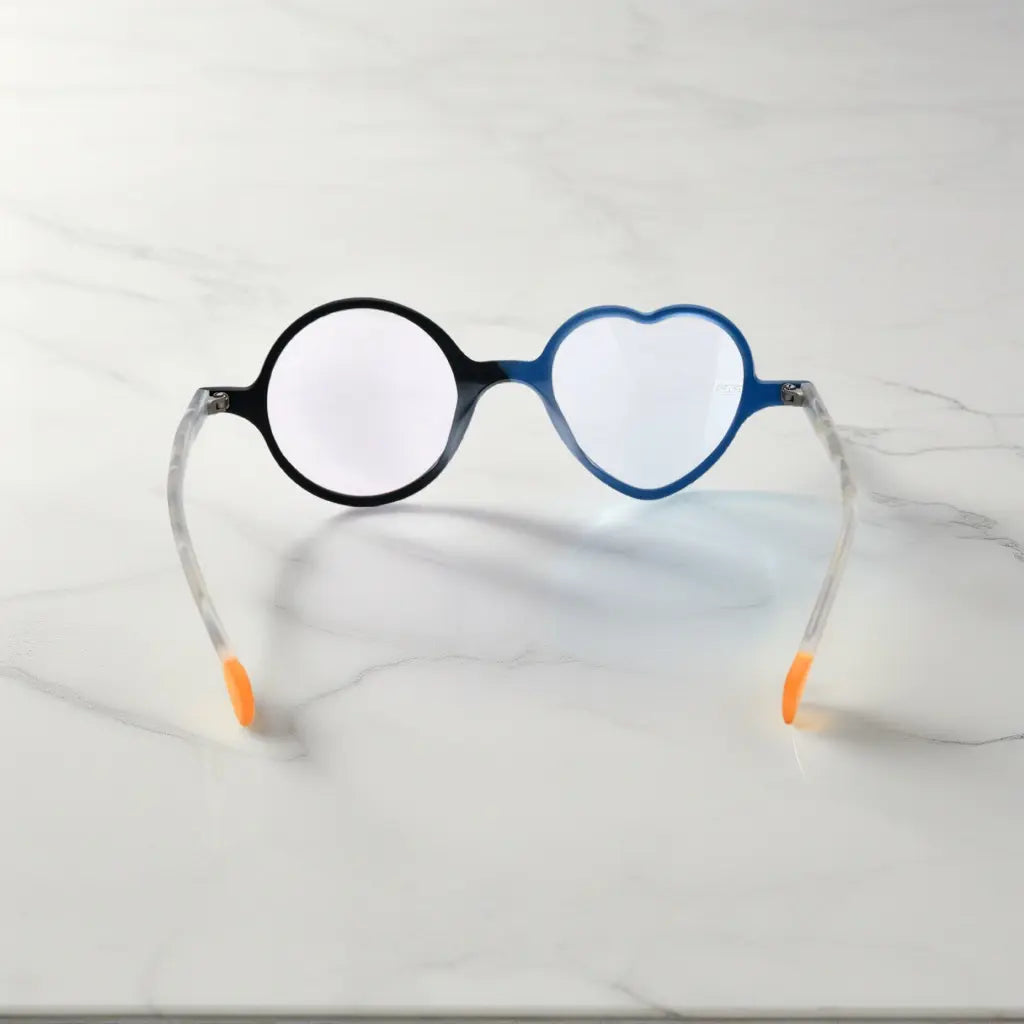 Back view of VoyueLens™ VL19377 in Ice Blue Cherry, showing full silhouette and lens contrast. Cool-toned ice blue paired with a cherry red accent in playful shape.