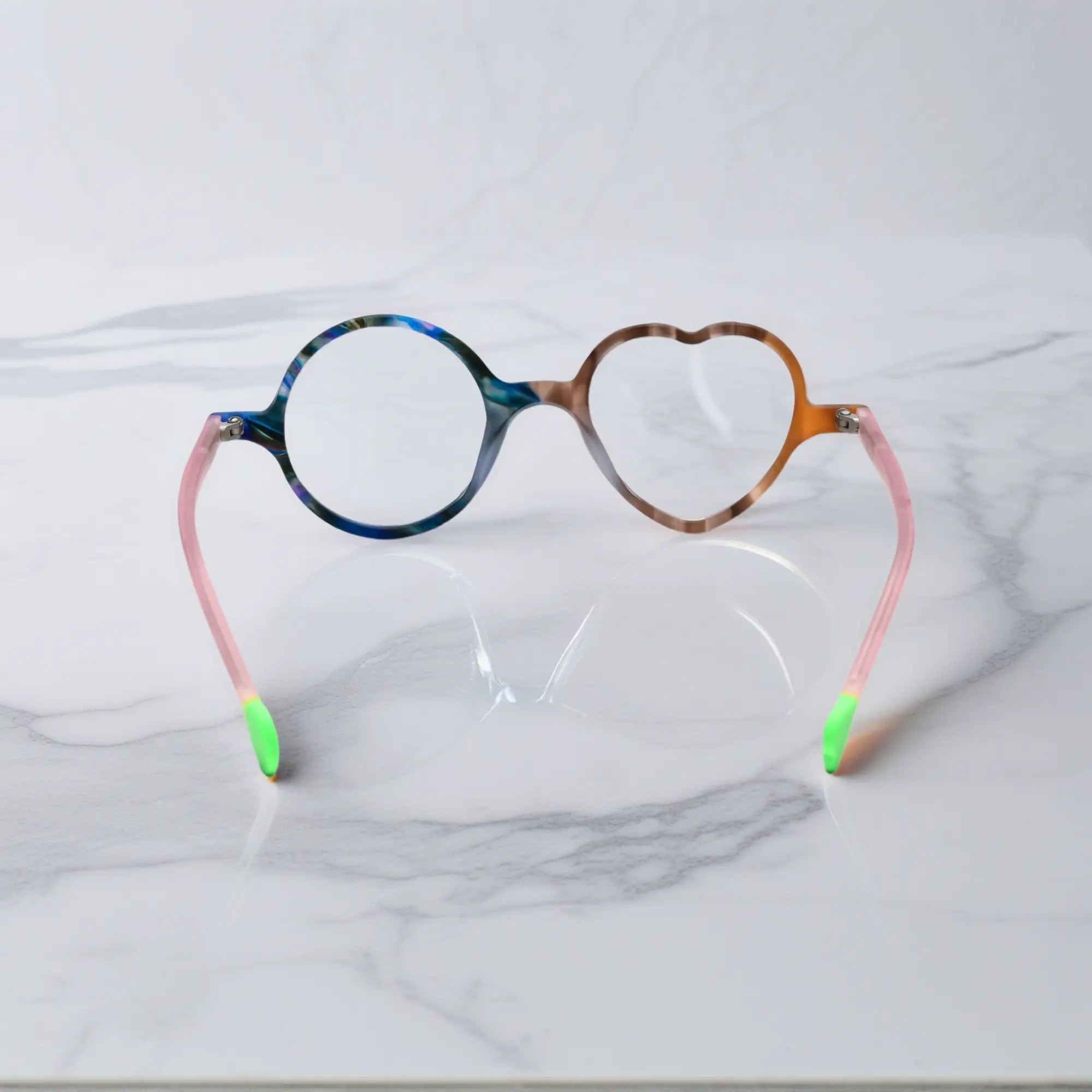 Back view of VoyueLens™ VL19377 in Cocoa Marble, showing full silhouette and lens contrast. Chocolate brown marble pattern with light blue contrast, earthy yet fun.