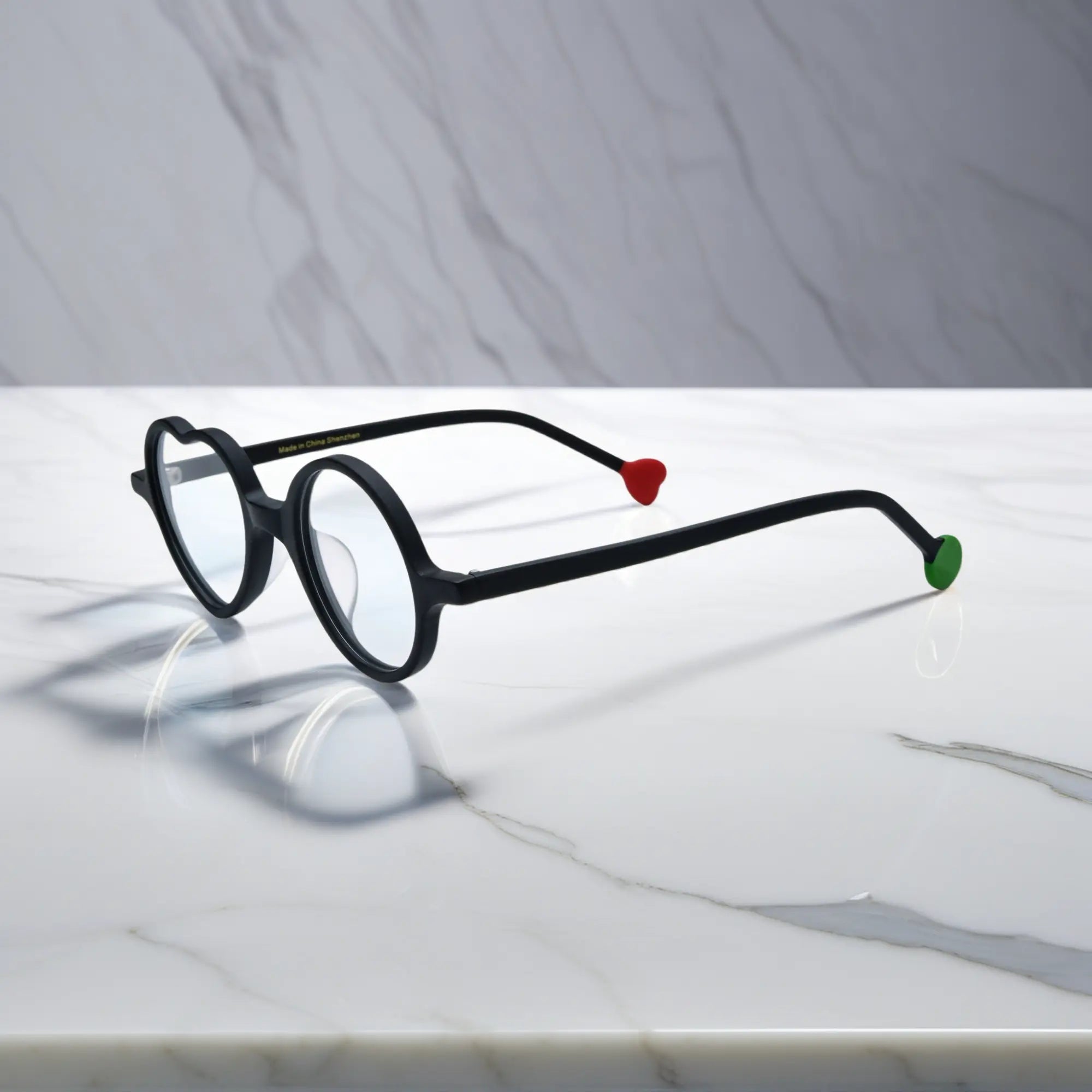 Side view of Charcoal Dusk variant, showcasing frame thickness and temple arm structure. Minimalist all-black frame with subtle matte texture and modern shape.